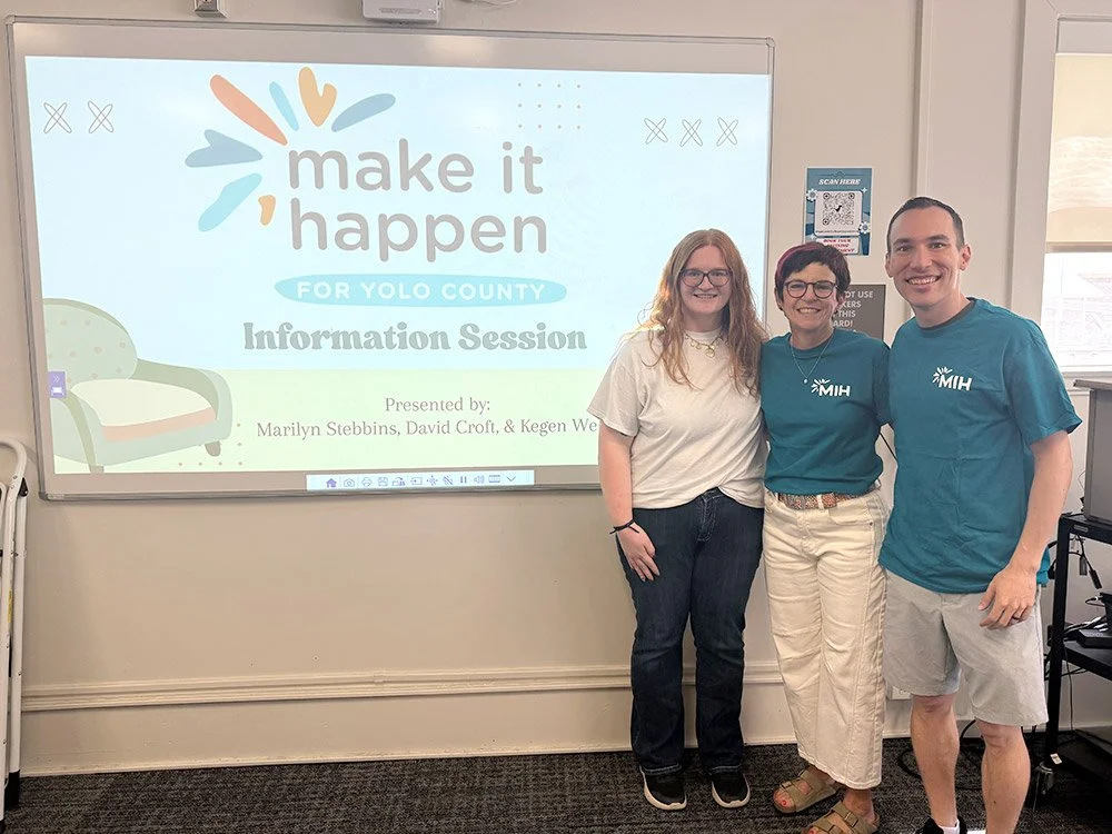 three people from MIH make a presentation to UCD students during the 2026 Guardian Scholars Move in Days
