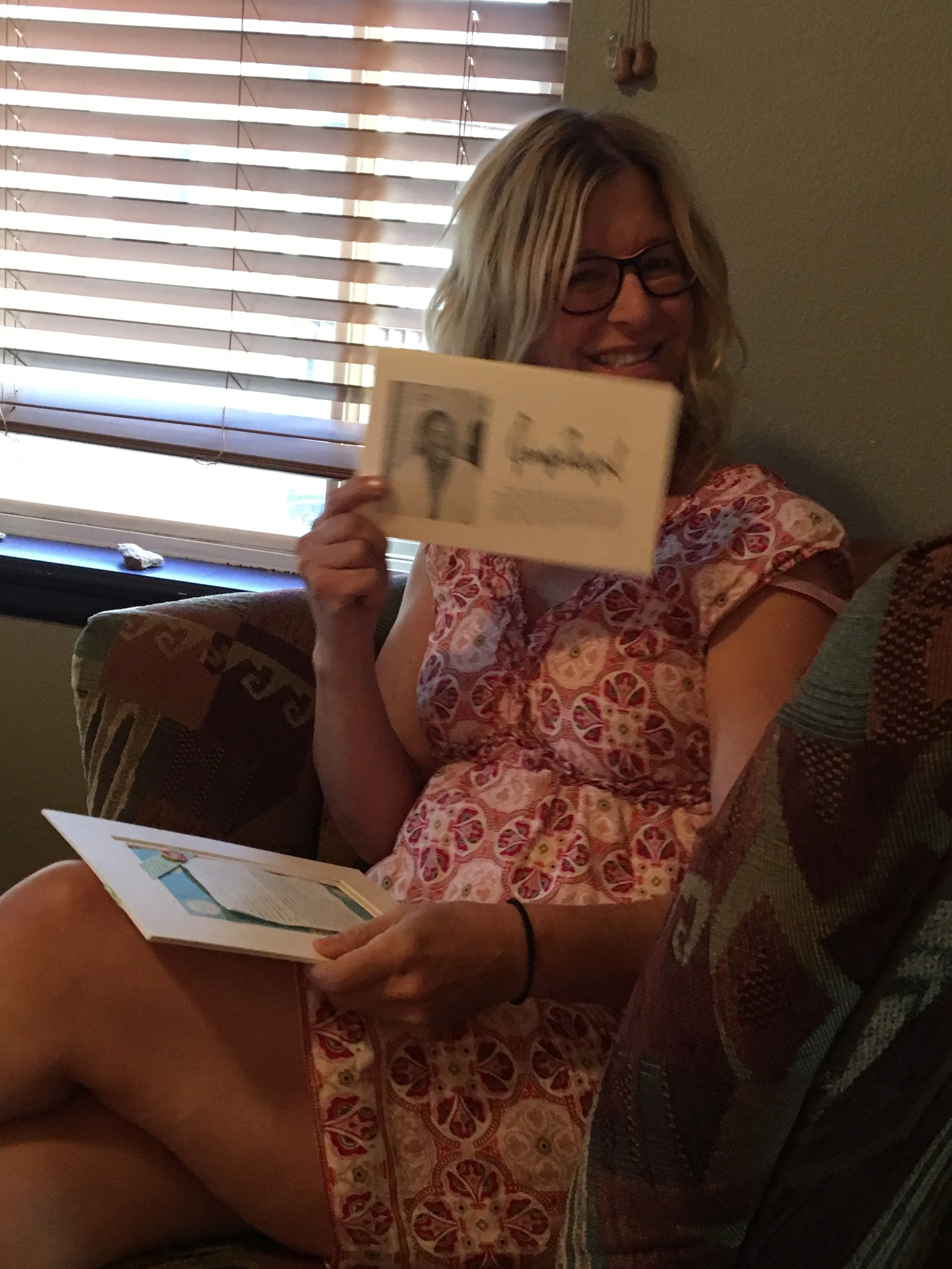 Jill holding pic up.jpg