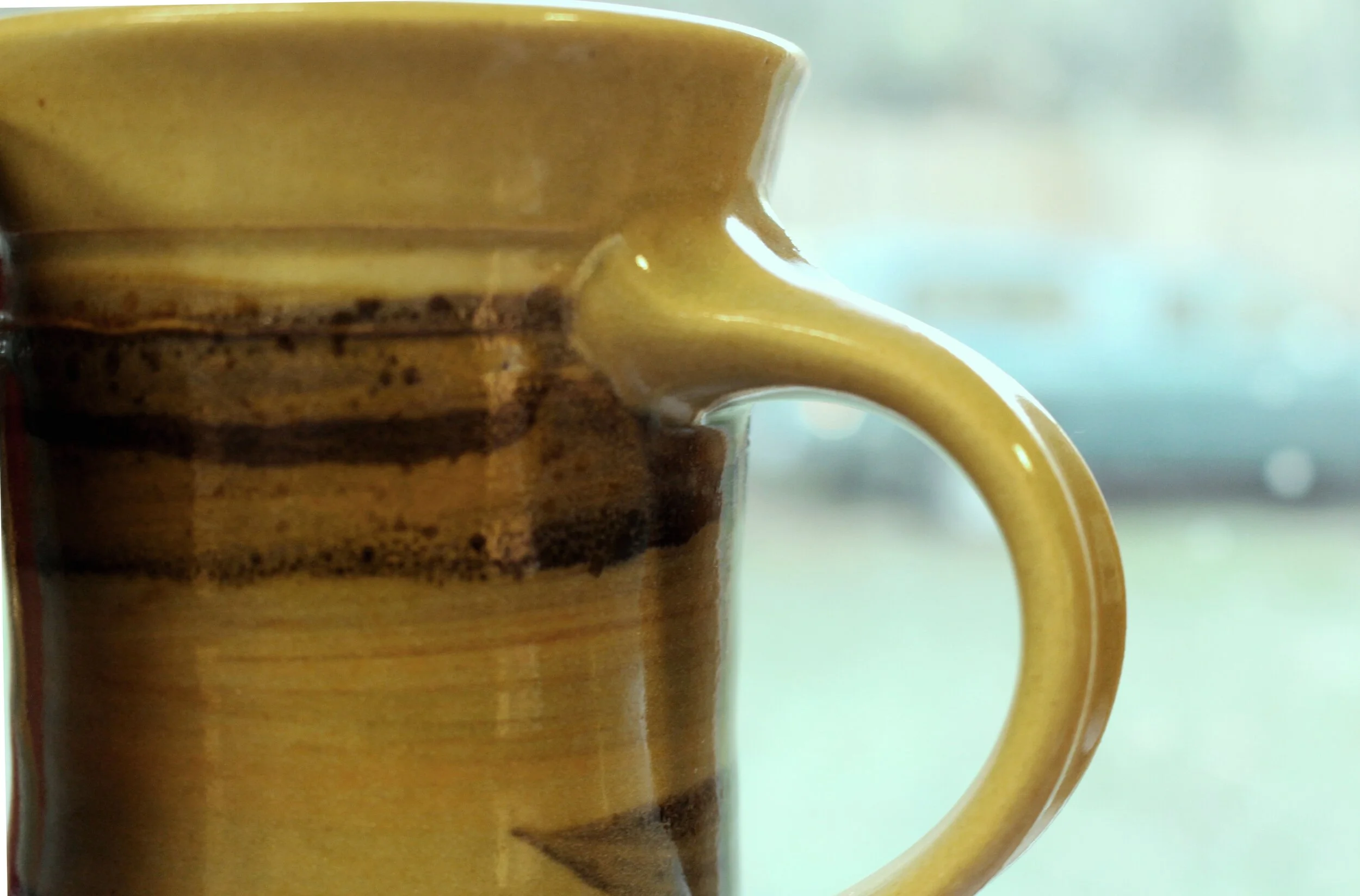 Pottery mug with Celadon Glaze