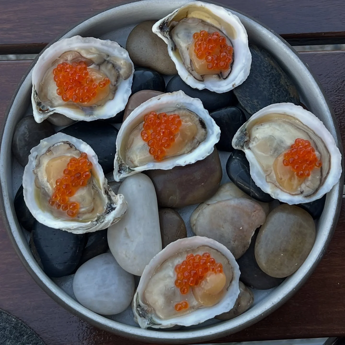 sweet amalias with fermented tomato xo and smokes trout roe