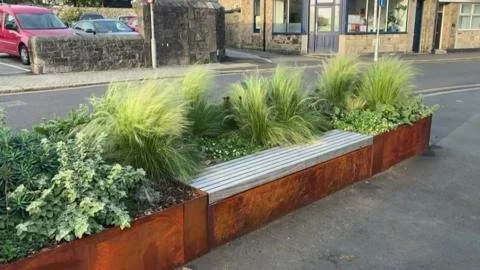 From Rust Buckets to Community Beautification: Penzance's Controversial Planters Spark Debate