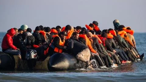 Caught in the Crossfire: Migrant Returns to UK After France Deal Fails