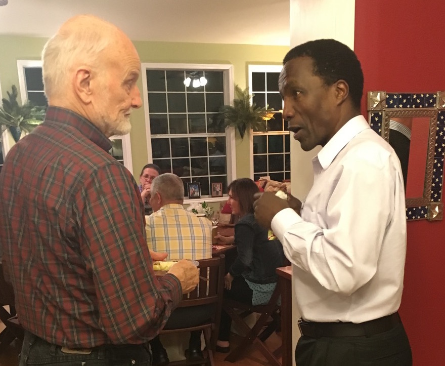Tim Lewis of Frontiers talking with Mutua Mahiaini of Navigators