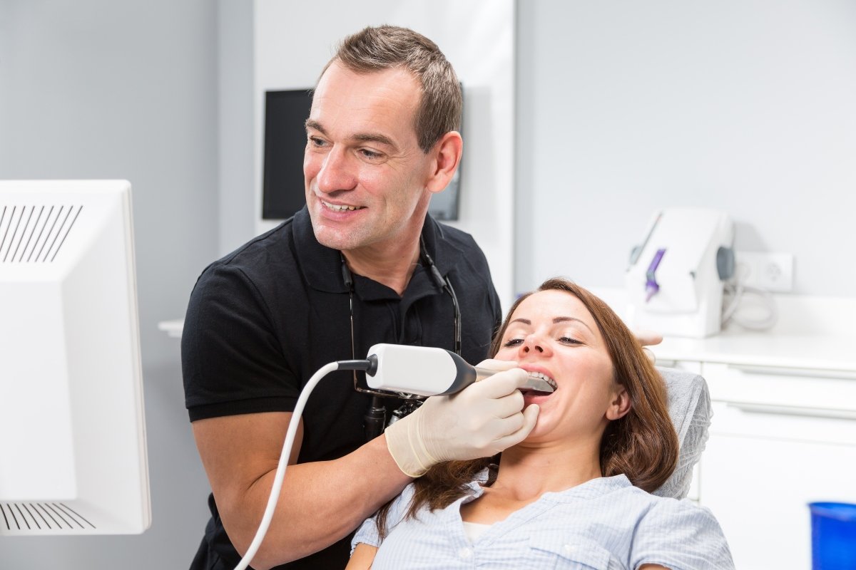 dentist using an intra-oral camera