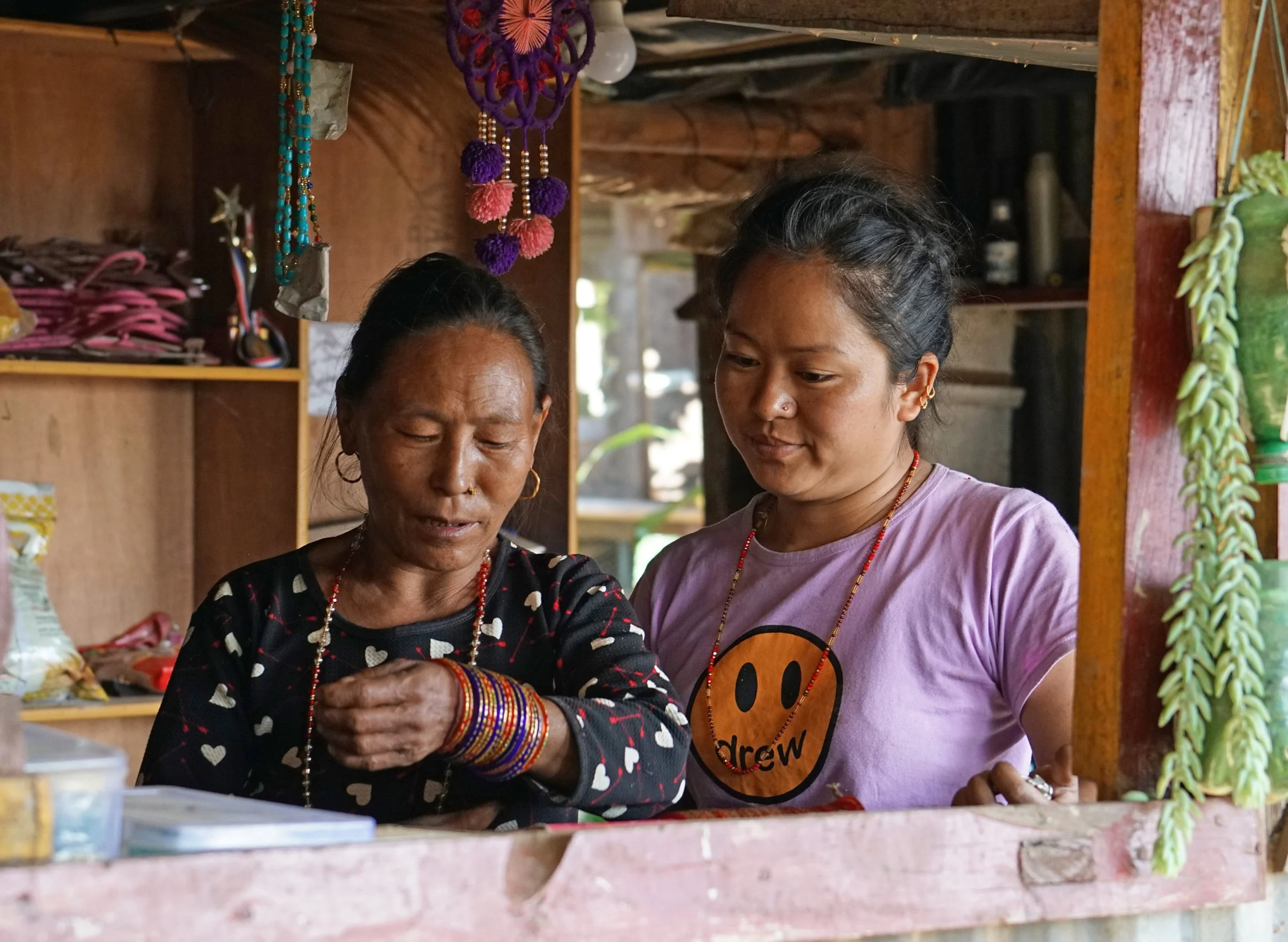 Customer tries on bracelets 4 smaller.jpg
