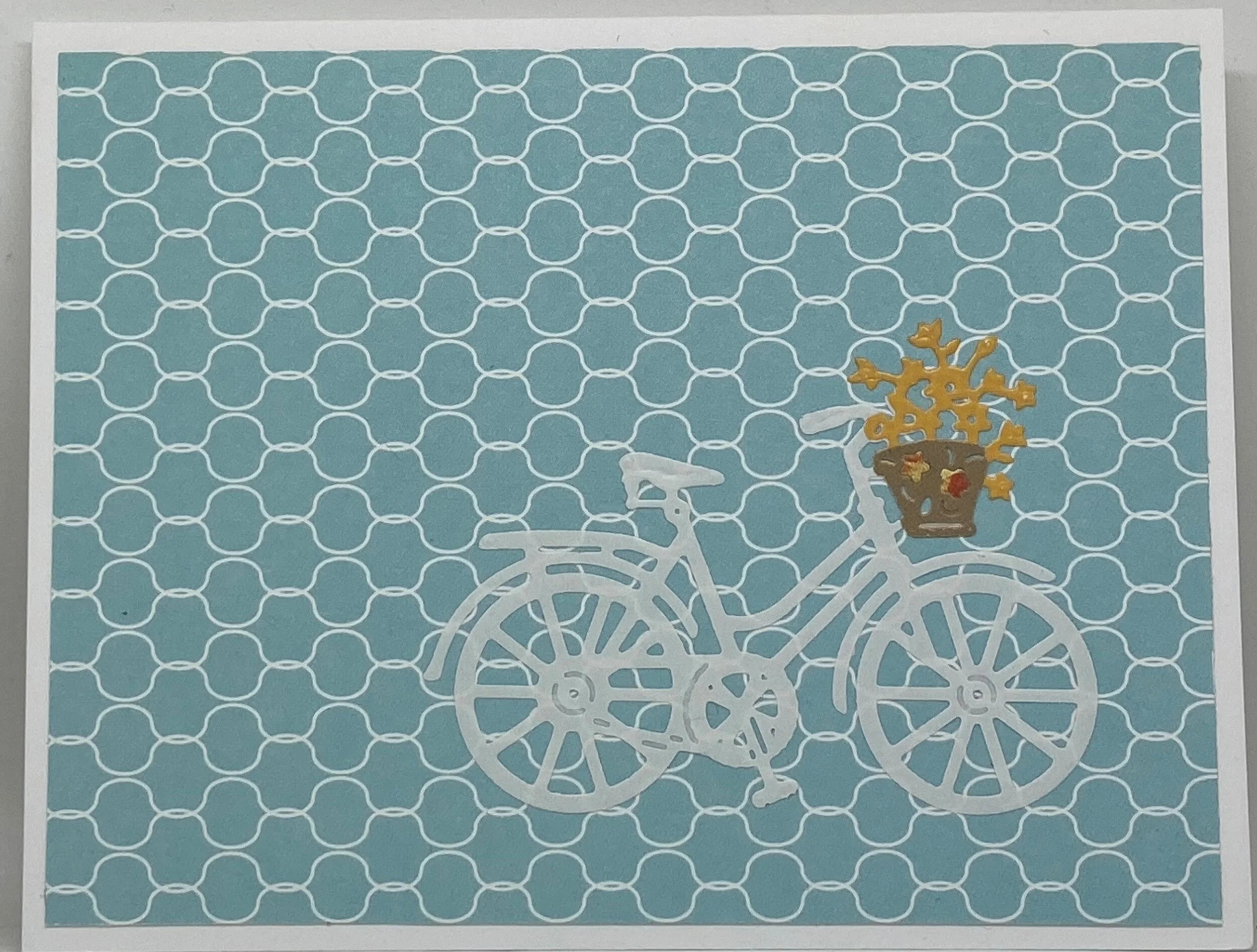 bicycle with red geranium front.JPG