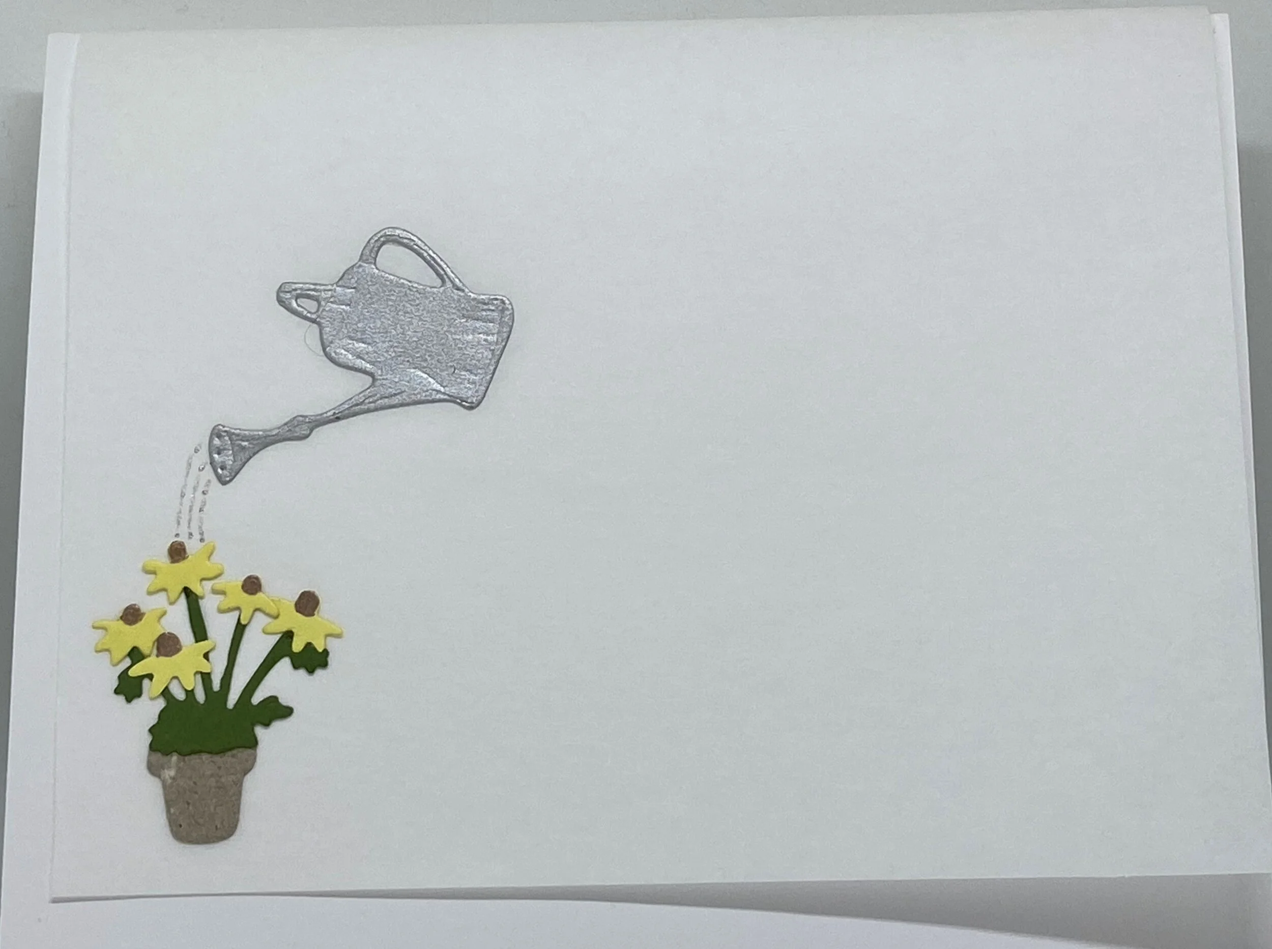 bicycle with yellow flower inside.JPG