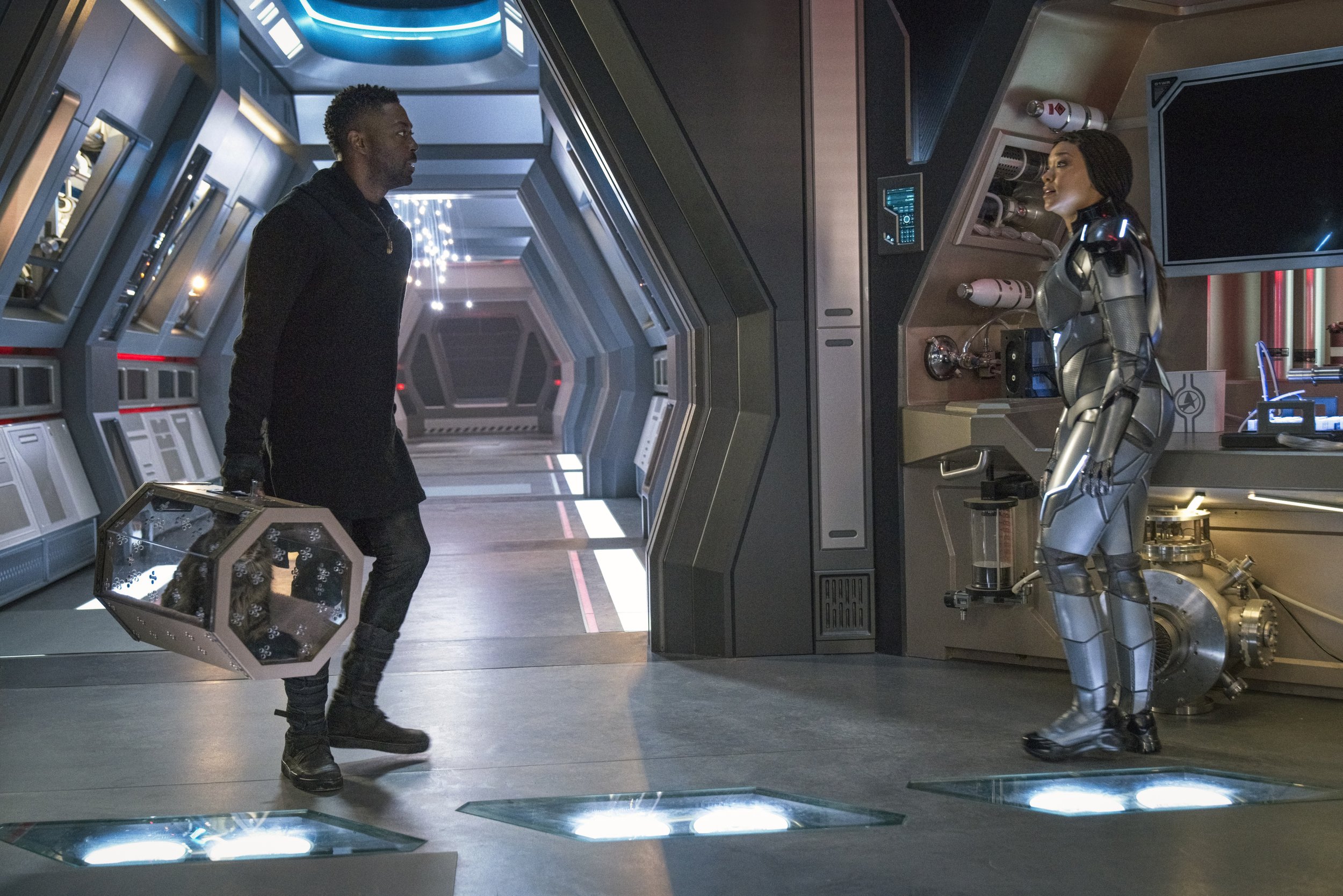   Pictured: David Ajala as Book, Grudge the cat and Sonequa Martin Green as Burnham of the Paramount+ original series STAR TREK: DISCOVERY. Photo Cr: Michael Gibson/Paramount+ (C) 2021 CBS Interactive. All Rights Reserved.  