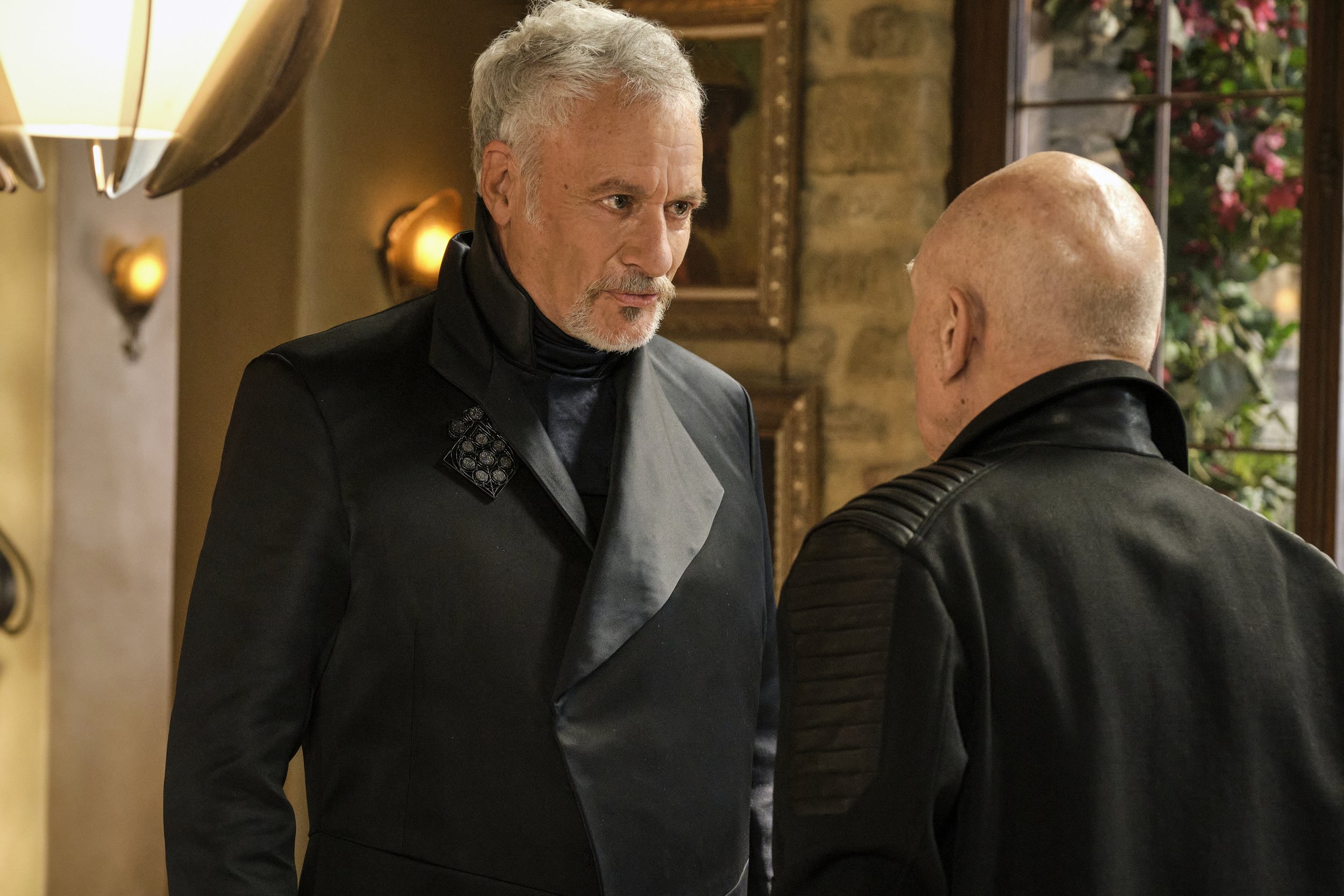   Pictured: John de Lancie as Q and Sir Patrick Stewart as Jean-Luc Picard of the Paramount+ original series STAR TREK: PICARD. Photo Cr: Trae Patton/Paramount+ (C)2022 ViacomCBS. All Rights Reserved.  