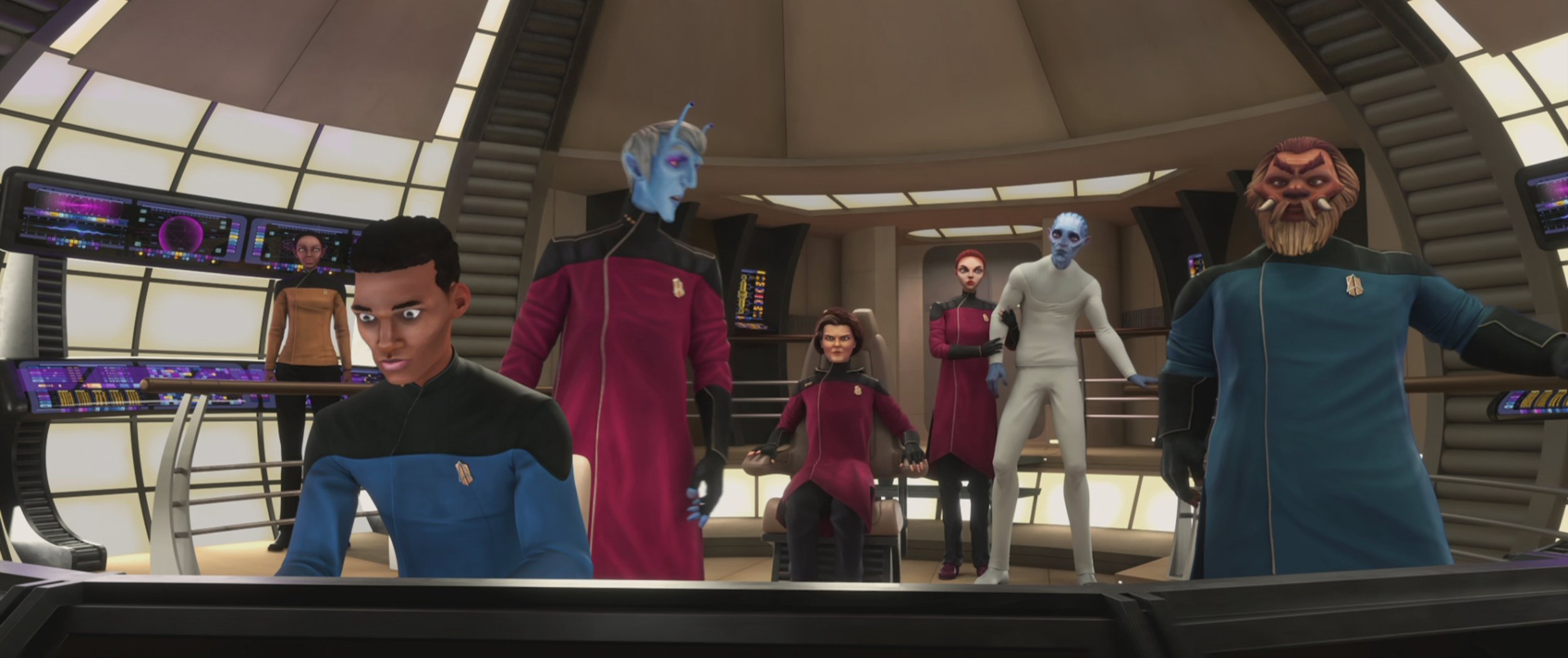   Daveed Diggs  as Commander Tyses,  Kate Mulgrew  as Janeway,  Jameela Jamil  as Ensign Asencia,  John Noble  as The Diviner, and  Jason Alexander  as Dr. Noum in STAR TREK: PRODIGY.  Image: Nickelodeon/Paramount+.  