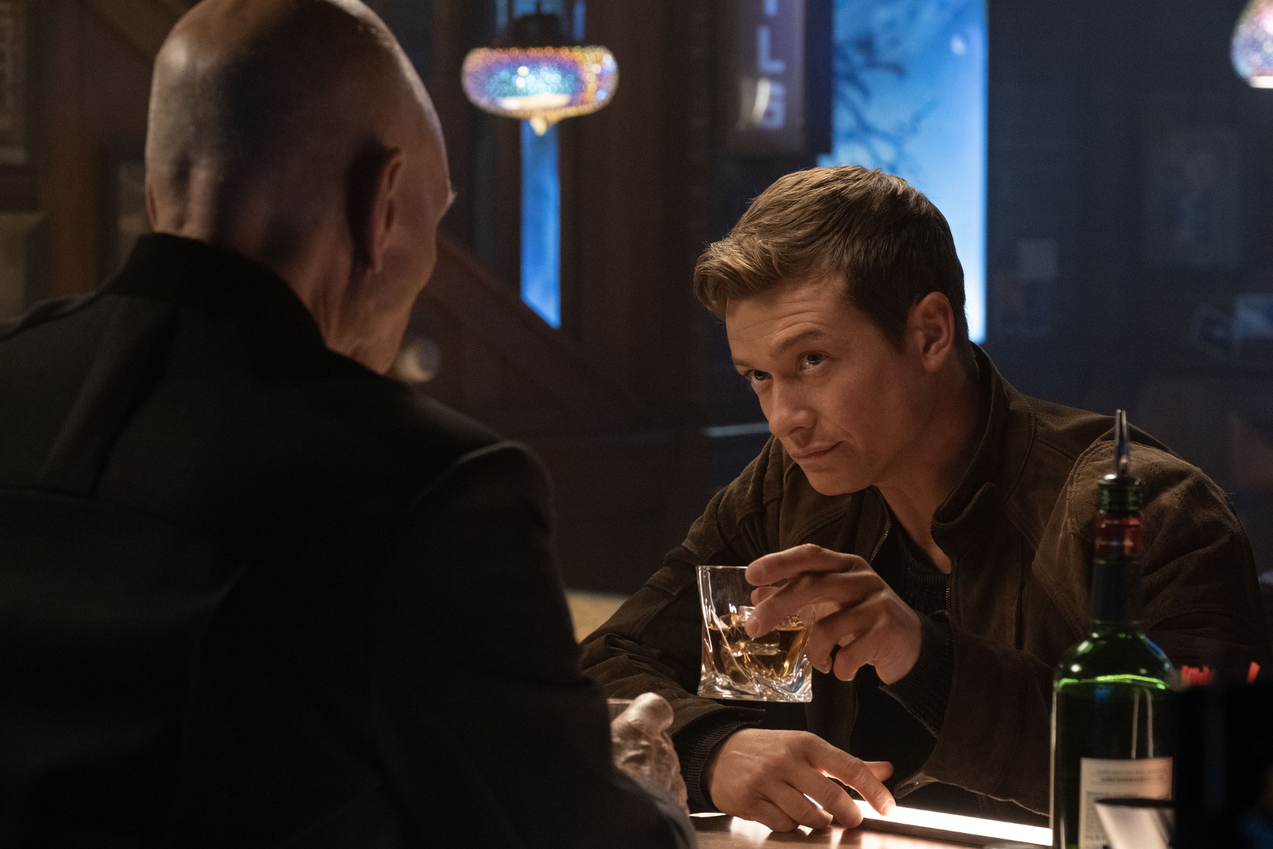  Patrick Stewart  as Picard and  Ed Speleers  as Jack Crusher.  Photo Credit: Trae Patton/Paramount+.  