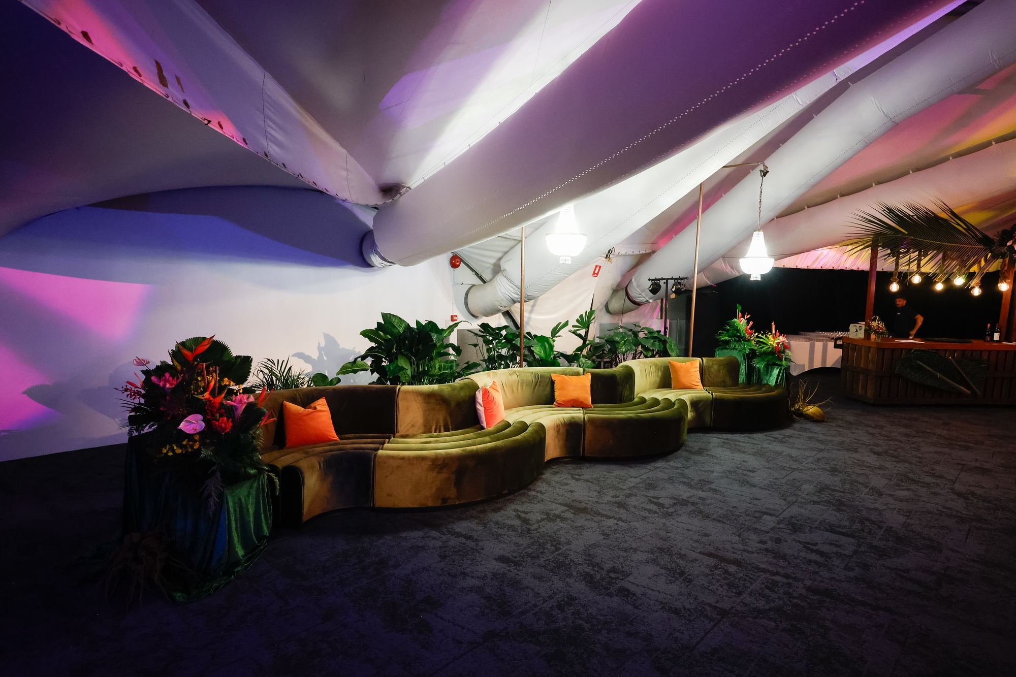 curved-lounge-seating-tropical-event-decor.jpg