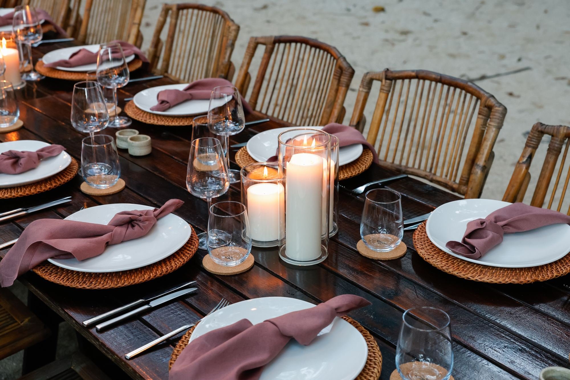 elegant-table-setting-rattan-chairs-candlelight.jpg