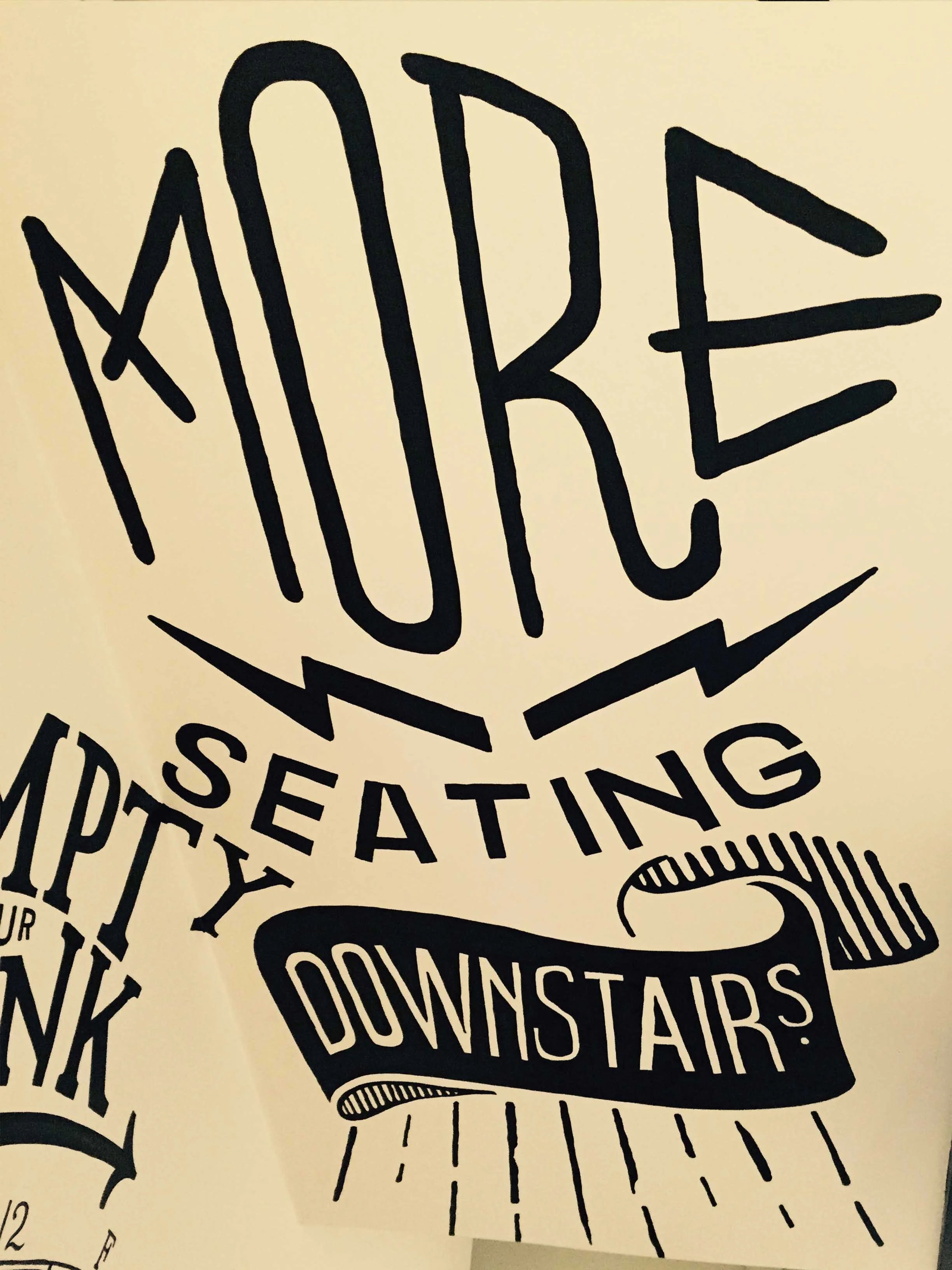 more seating downstairs.jpg