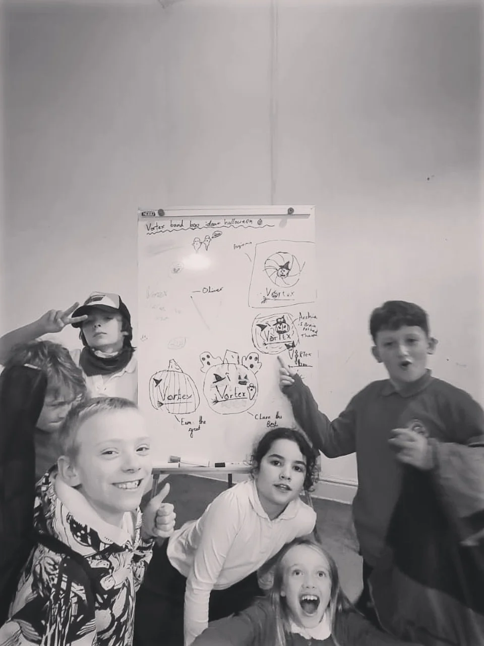 One of our Monday bands &ldquo;Vortex&rdquo; working busy on their Halloween themed band logo ideas earlier this week. This group have been working on learning how to use GarageBand and recording their own music in their band sessions 🎧 🎶 🎃