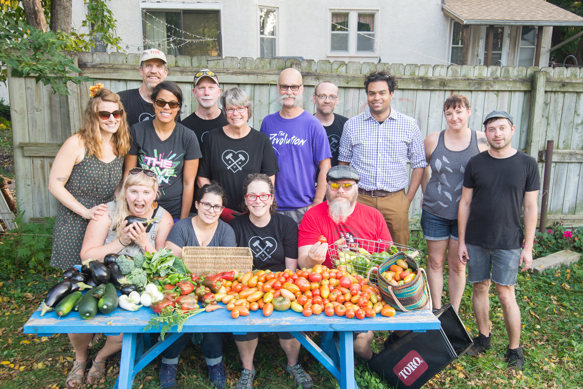 Dangerous Man community volunteers pose with a day’s harvest for Every Meal, 2017. 