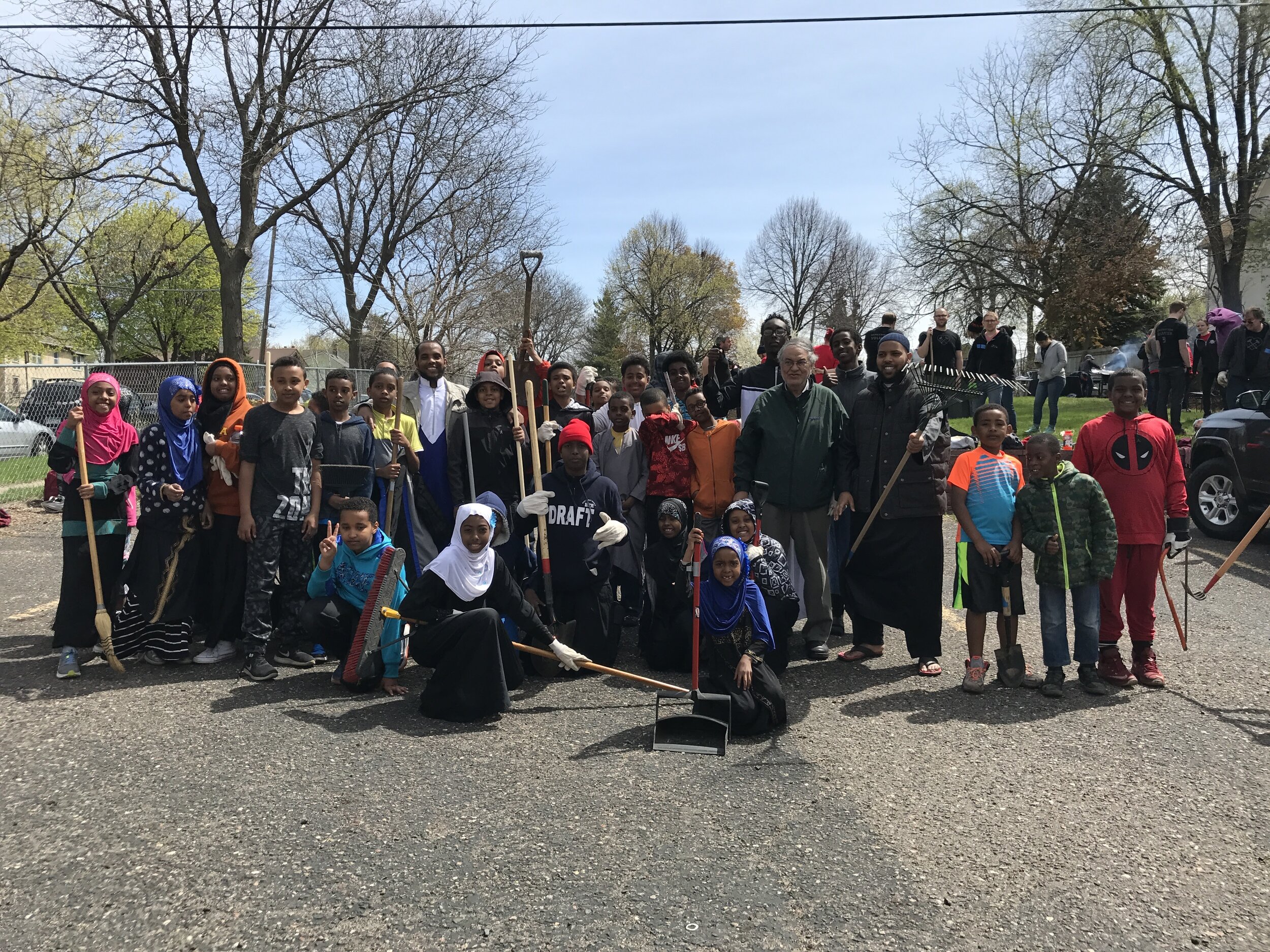  Students of The Islamic Center of Minnesota/Masjid Al-Iman pose together after helping start the garden, 2017. 