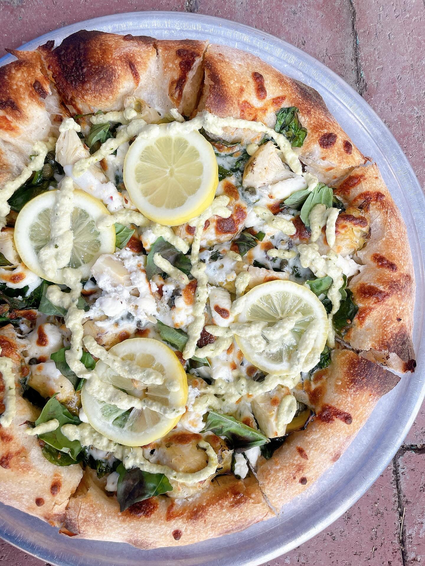 Last week for our Choked Up sourdough flatbread!
.
Grilled artichokes, spinach, capers, basil, pickled lemon slices, lemon ricotta, mozzarella, garlic oil, and an artichoke sauce drizzle
