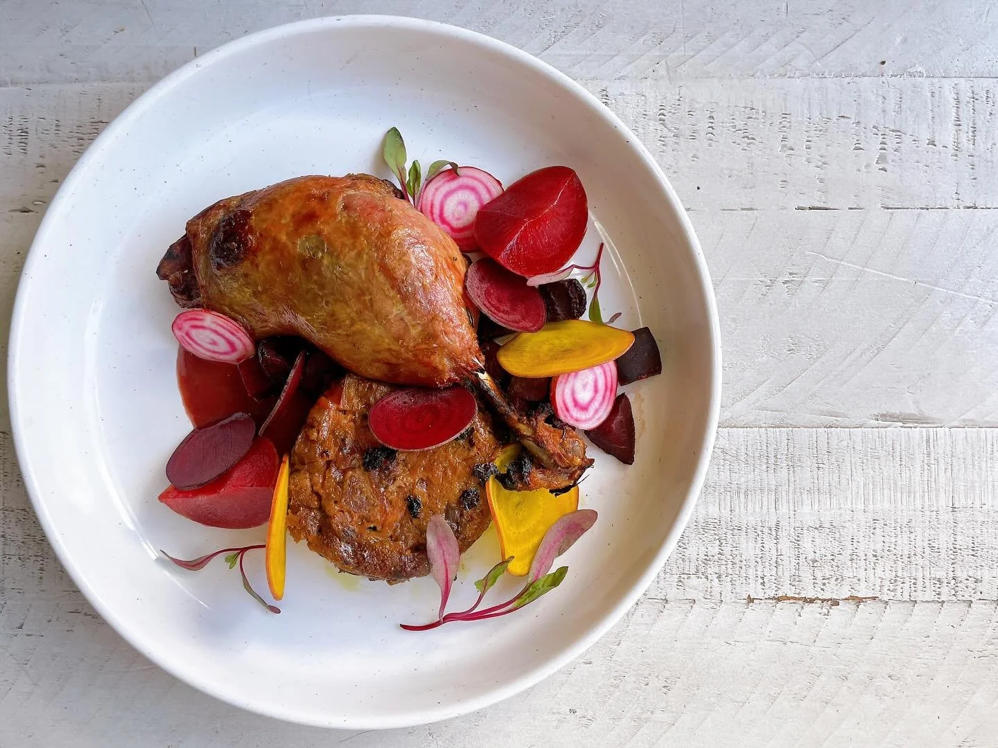 A few days left for this stunner!
.
Roasted duck leg with roasted beets, shaved beets, beet and spinach bread pudding, plum sauce, fresh red plums, bulls blood micro greens