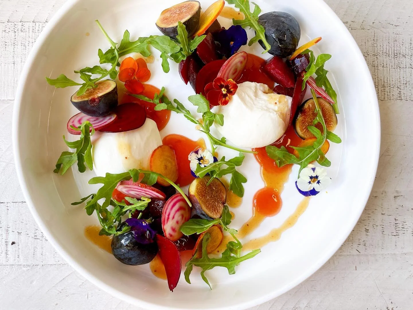 Come try our boo-rata salad with burrata, roasted beets, shaved beets, fresh figs, plum jam, arugula, hot honey, lemon EVOO, fig balsamic reduction. 👻 
.
We’re open all month long! Come dressed up in Halloween attire on October 31st and get 20