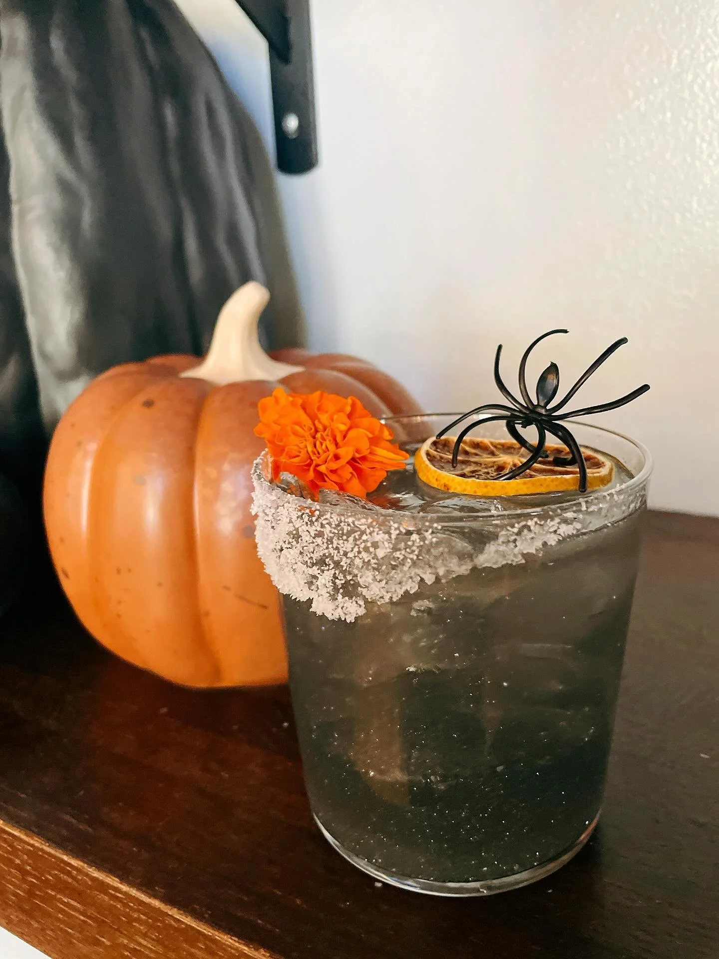 Our spooky season drink menu has cocktails for the ghouls! 
.
Try the Shadow Ritual with mezcal, charcoal simple syrup, italicus, lime, orange, salt rim. 
.
Come dressed up for Halloween on our last day of the season , October 31st and get 20% off yo