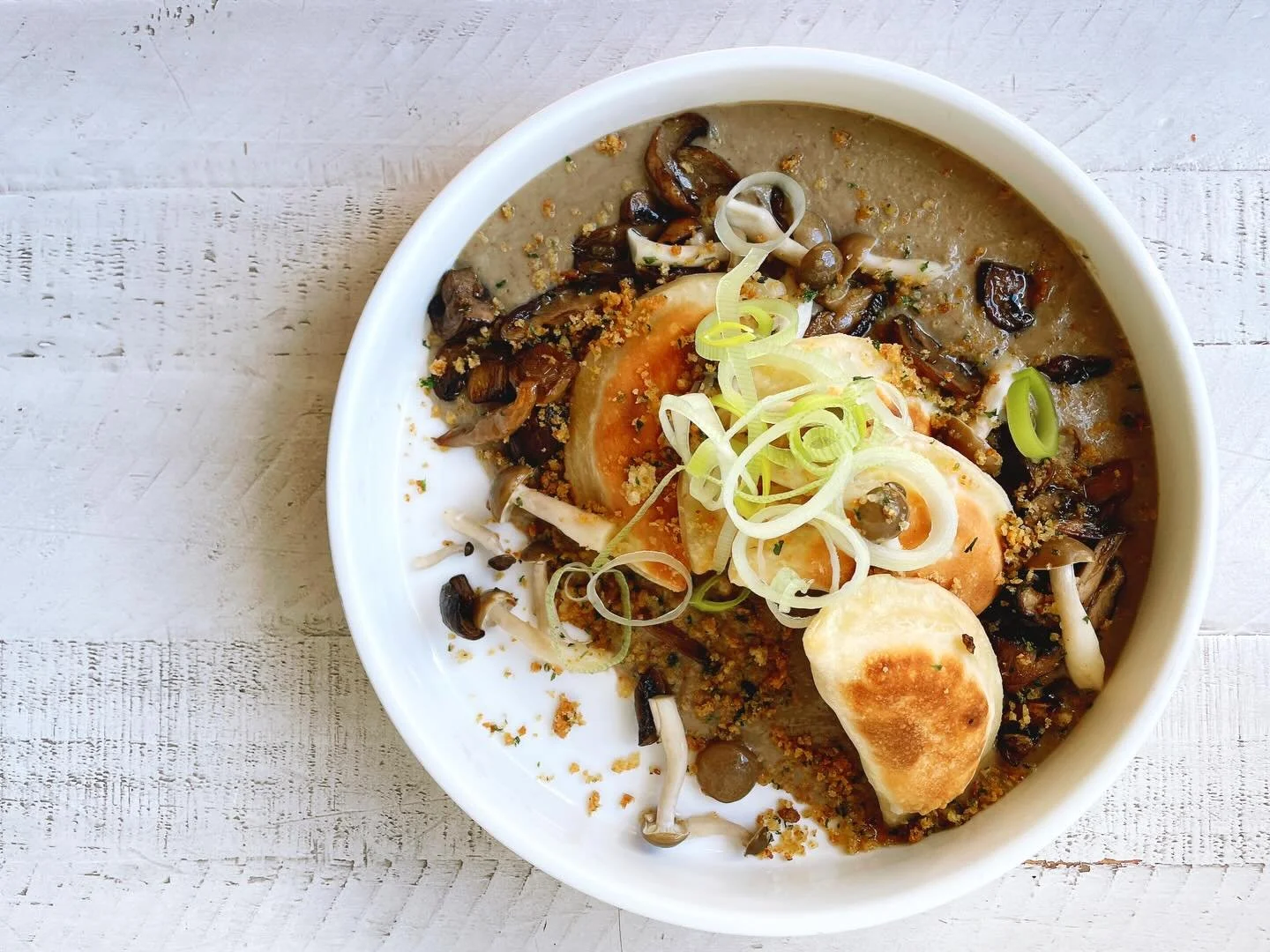 We reopen Thursday, December 4th! See ya soon!
.
Potato, goat cheese, onion pierogi with mushrooms leek bisque, roasted mushrooms, pickled beech mushrooms, leeks, breadcrumbs.