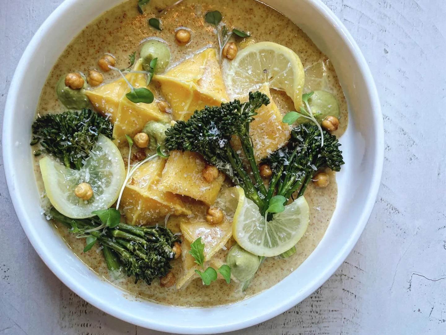 Cheddar sacchetti on the menu now! 
.
Served with roasted broccolini, broccoli pur&eacute;e, mustard beurre blanc, crispy chickpeas, pickled lemons, parmesan