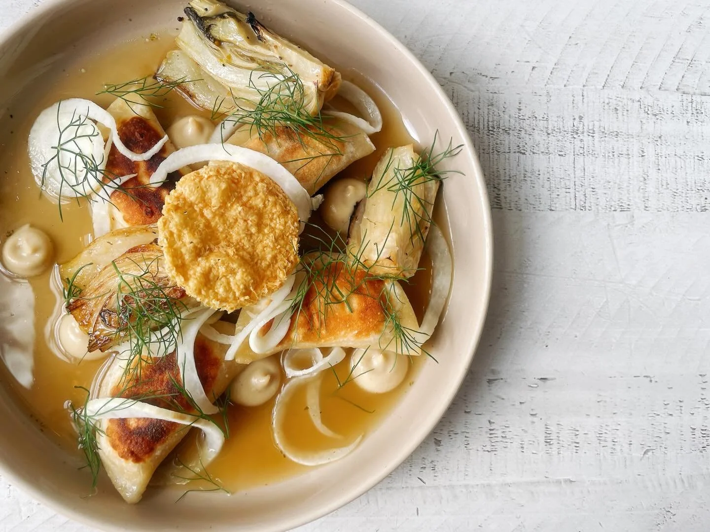 June is the perfect time for fennel in the Rockies. Even the fennel-haters come around. Check it out on our pierogi right now!
.
Potato, onion, goat cheese filled pierogi with braised and caramelized fennel, pickled fennel, fennel fronds, roasted gar
