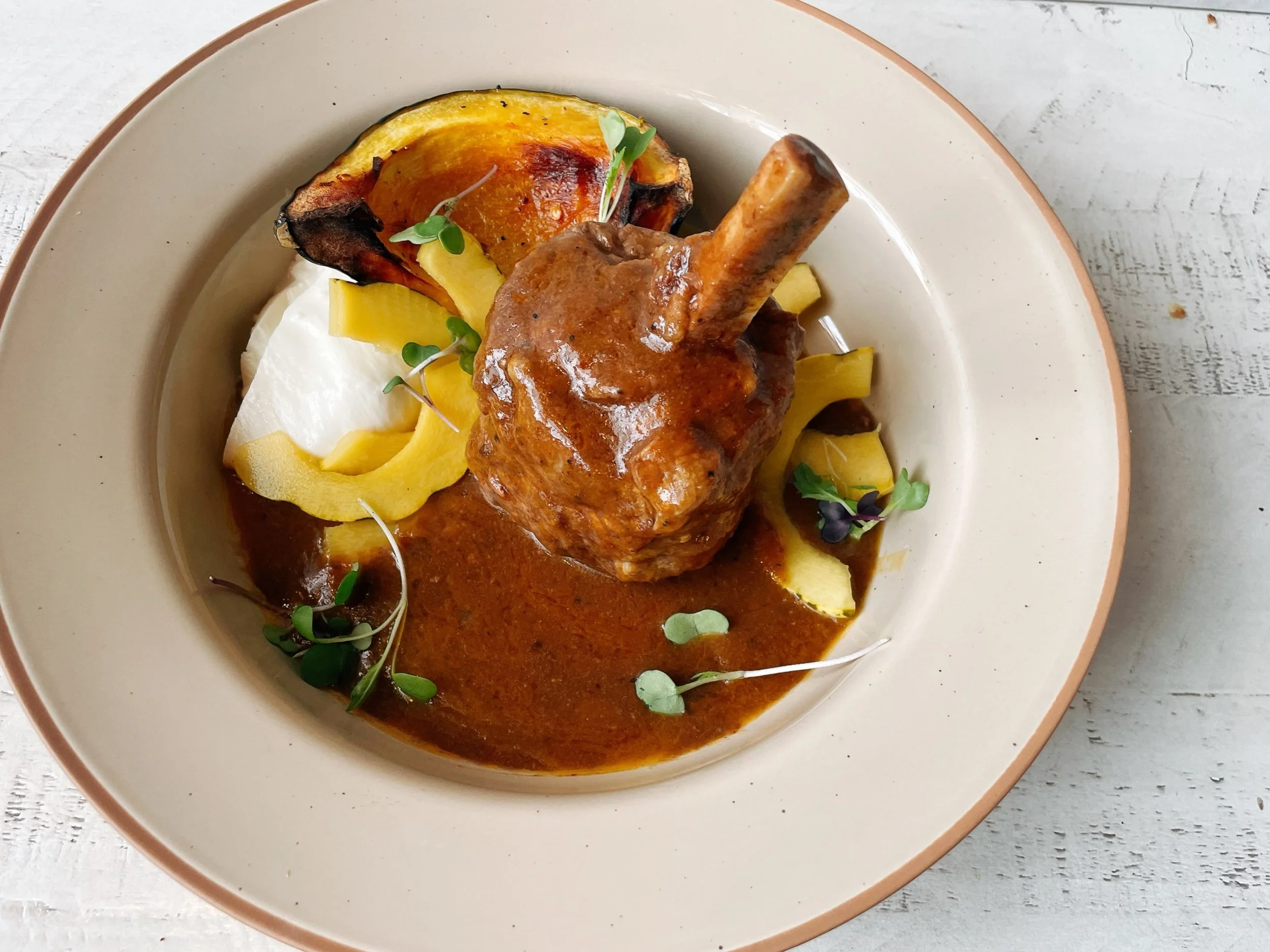 Beef short rib lollys back on the menu for a limited time! 
.
Beef short ribs with calabrian chile beef au jus, maple roasted acorn squash, pickled delicate squash, burrata. 
.
We&rsquo;re open Wednesdays through Sundays until October 30th!