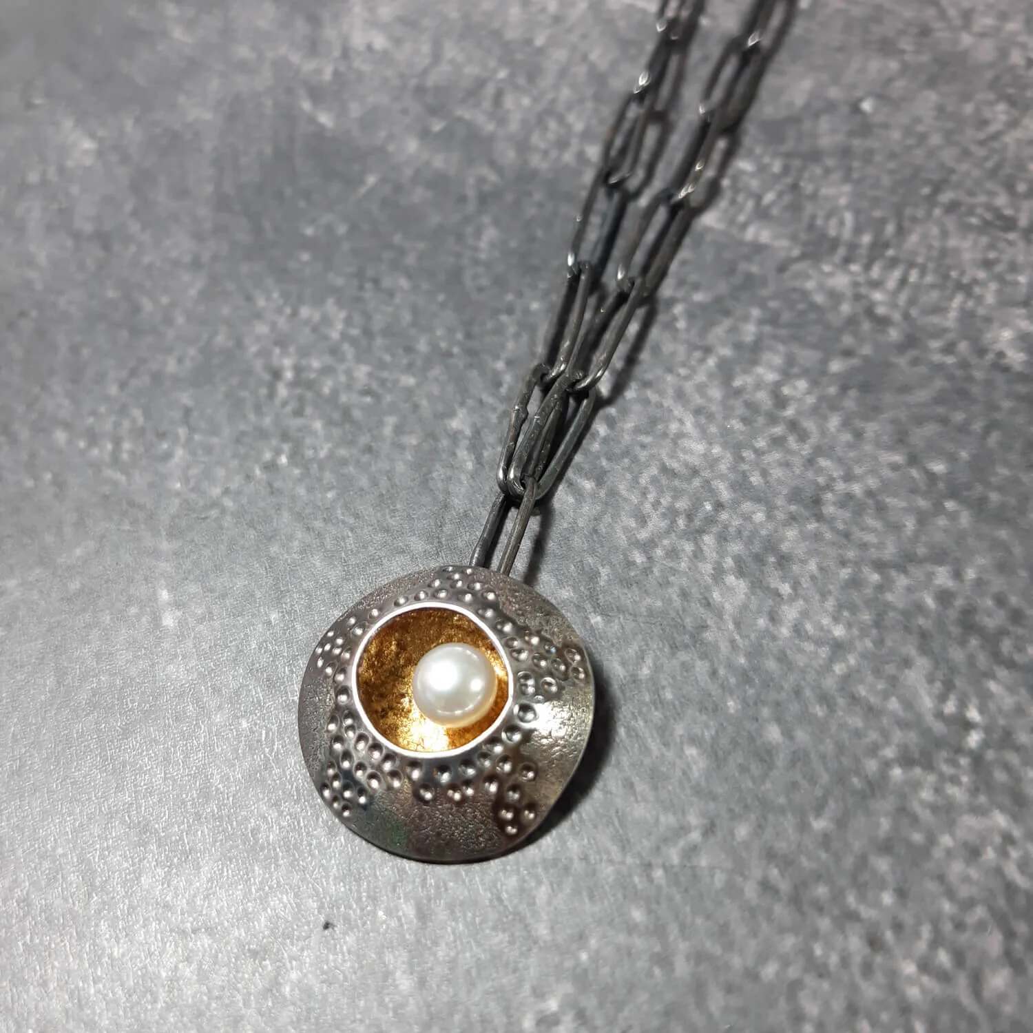 dark-closed-limpet-medium-necklace-patinated-silver-goldleaf-pearl-echinoderm-pattern2-handmade-long-oval-chain-image1.jpg