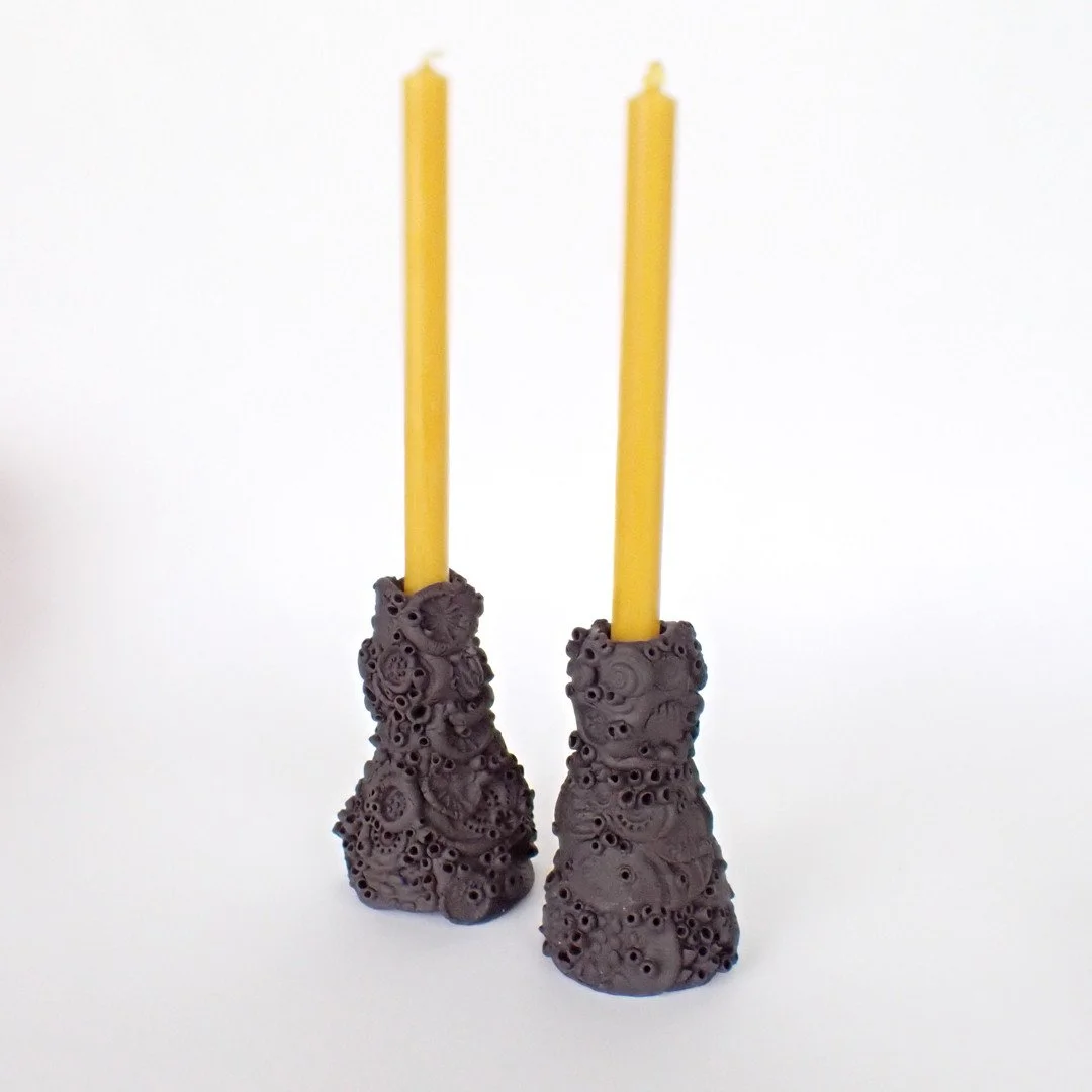 These two heavily textured black porcelain candlesticks are available at the Wonderworks Contemporary Craft Fair this weekend.  Conversation heirloom pieces for the Christmas dining table.⁠
Jubilee Hall, Chagford TQ13 8DP. 10am-5pm Saturday &amp; Sun