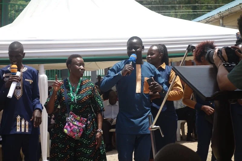 K14 and a third teacher sings.JPG