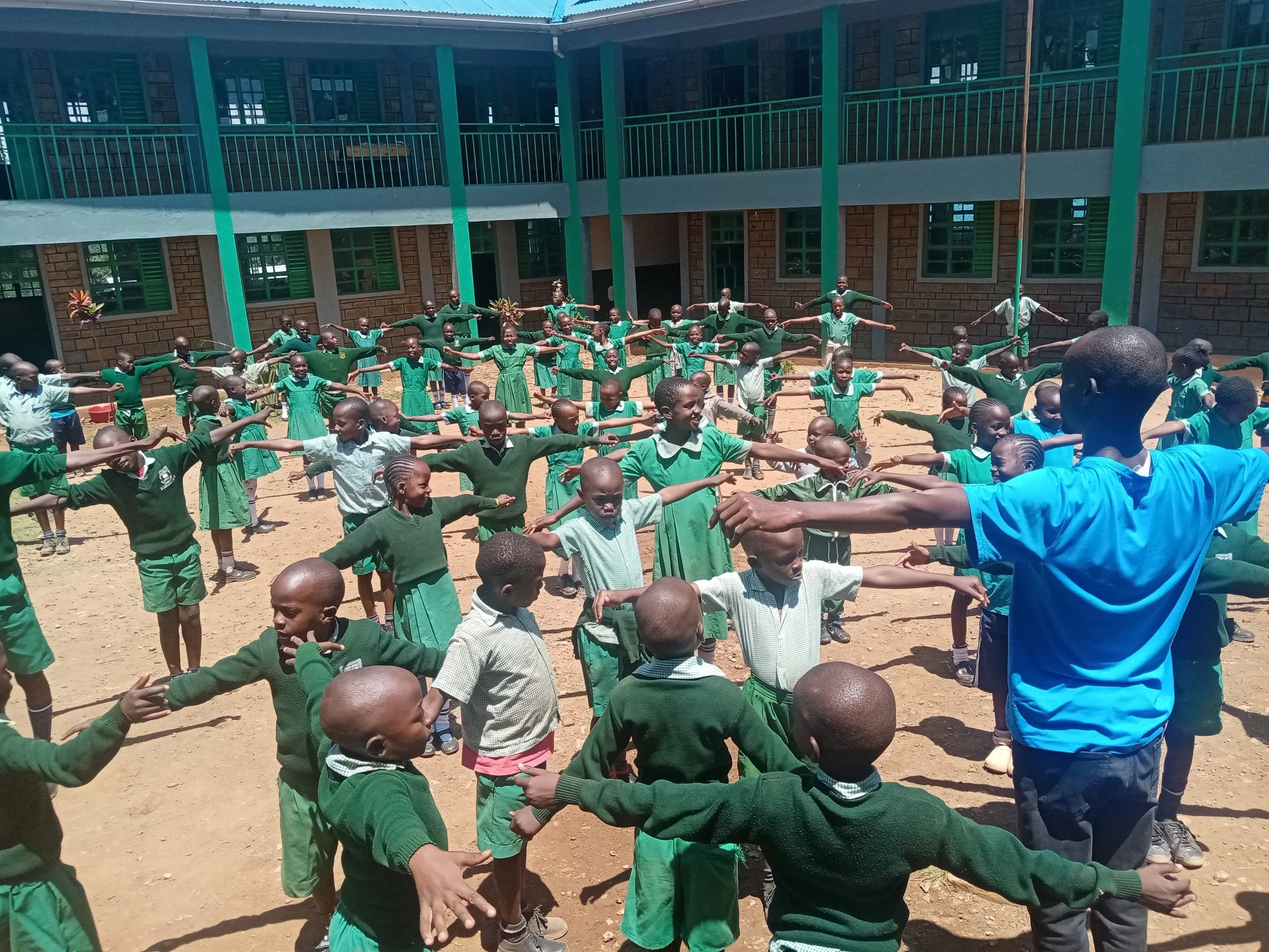 Teacher Tobias at PE time.jpg