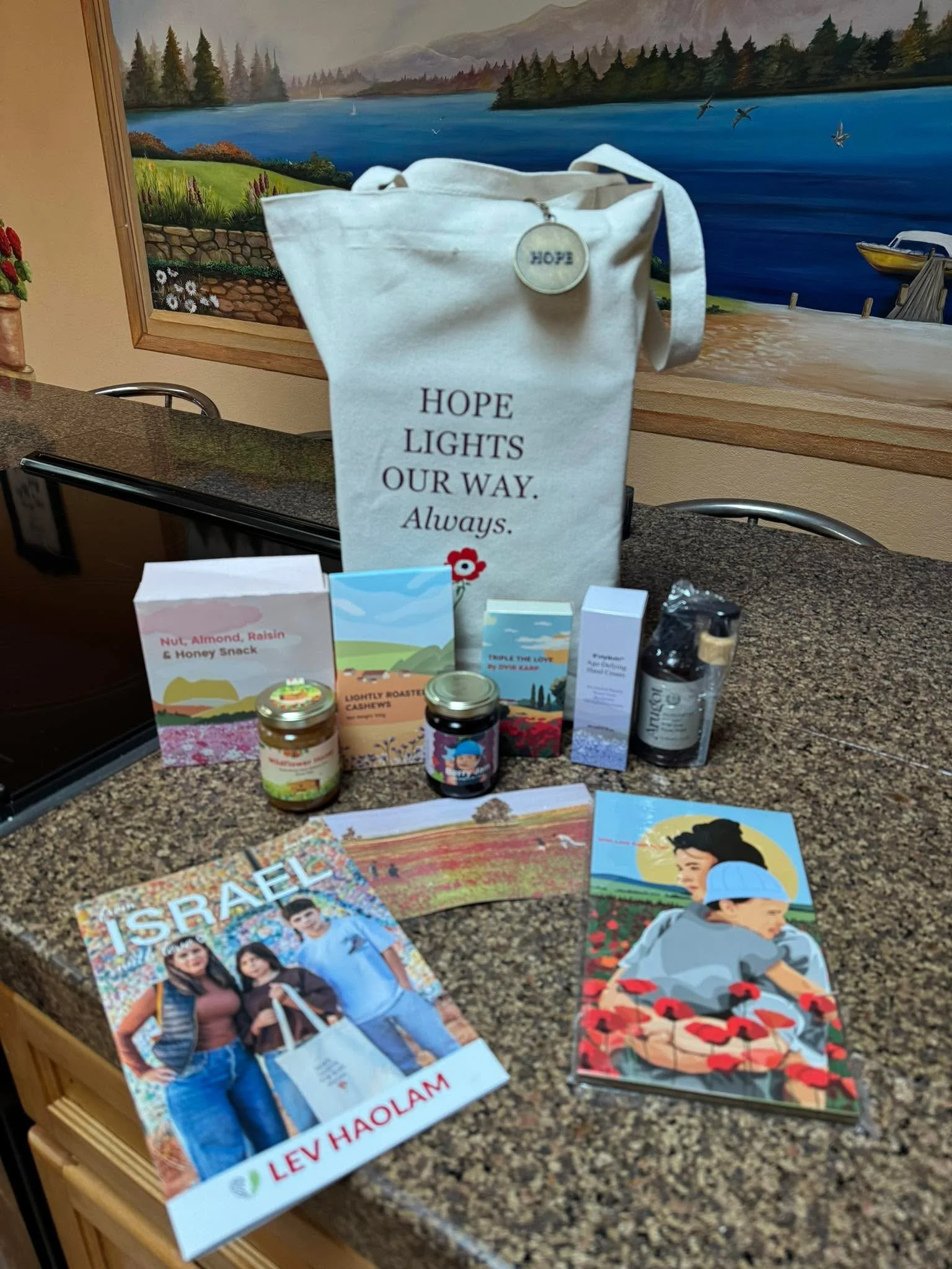 My monthly gift box of locally made products of Israel was once again filled with tasty treats, beautiful products, great stories and a theme which carries through each product. 

This month is the theme Calanit (the red wildflower anemone) which bla