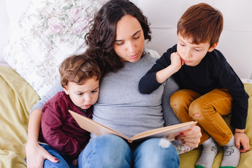 Raise+a+Book+Lover+How+to+Read+with+Your+Child+at+Every+Age_Mom+and+two+kids+reading.jpg