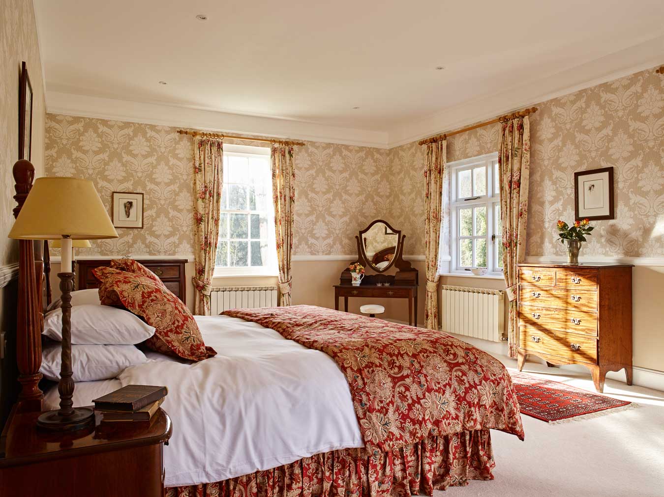 The grand master bedroom with its Super King size bed and triple aspect views in Flear House. 