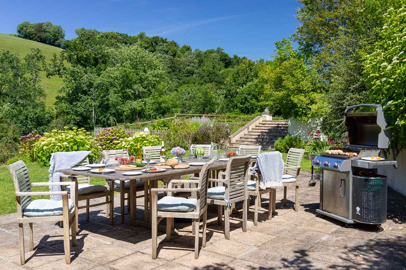 BBQ terrace and 3 burner gas BBQ set in the mature and large garden of Flear House.
