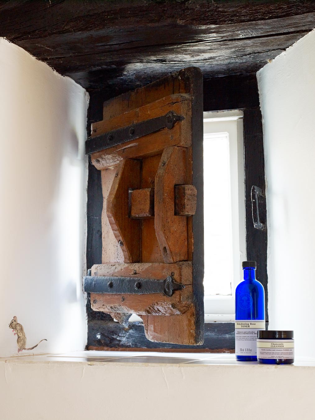 The original wooden shutter in the family bathroom in 1843 cottage Flear Farm. 