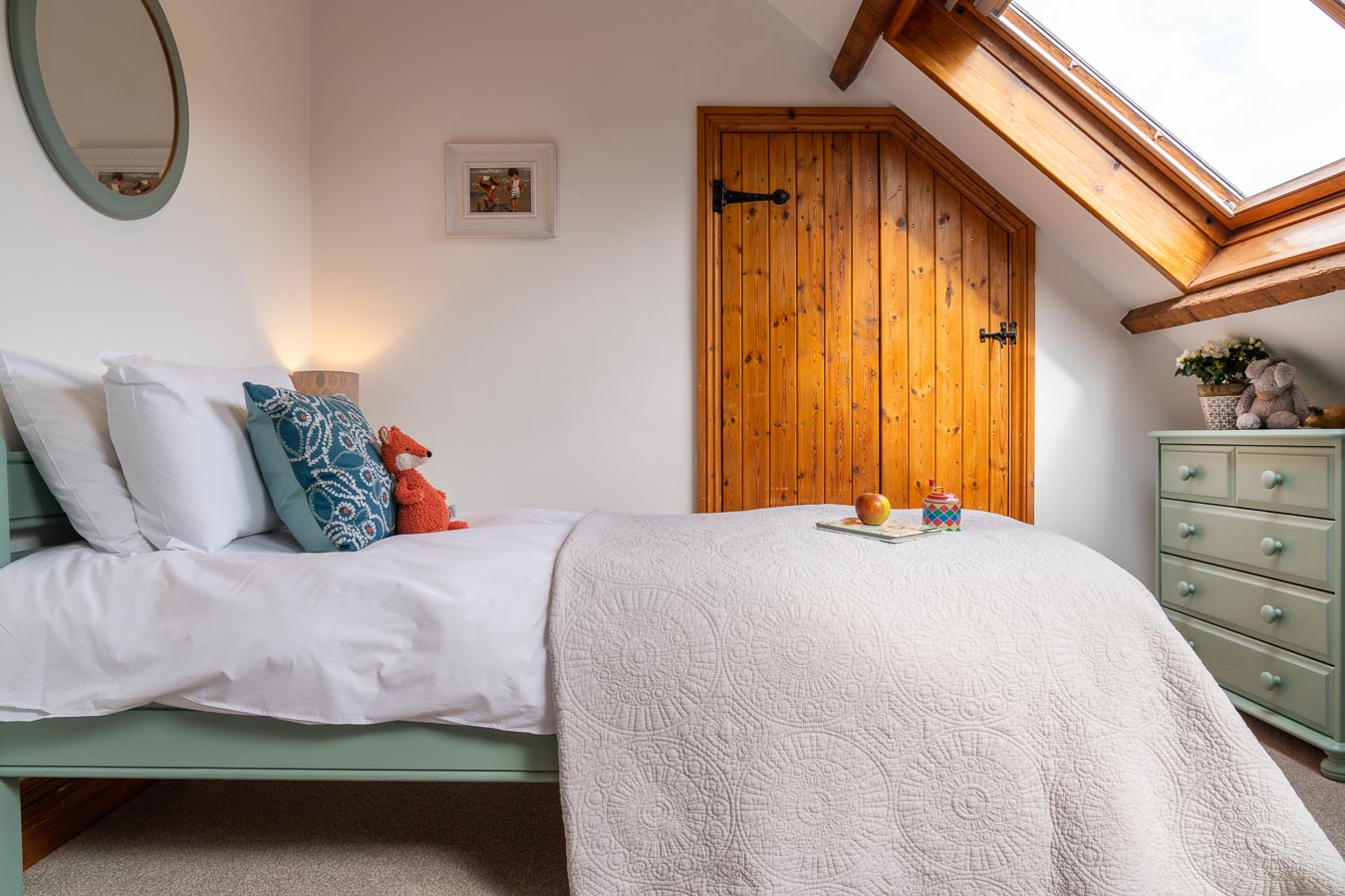 The twin bedroom with duck egg colour scheme and 100% Egyptian cotton bedding. Mangers Cottage, Flear Farm Holiday Cottages Devon.  
