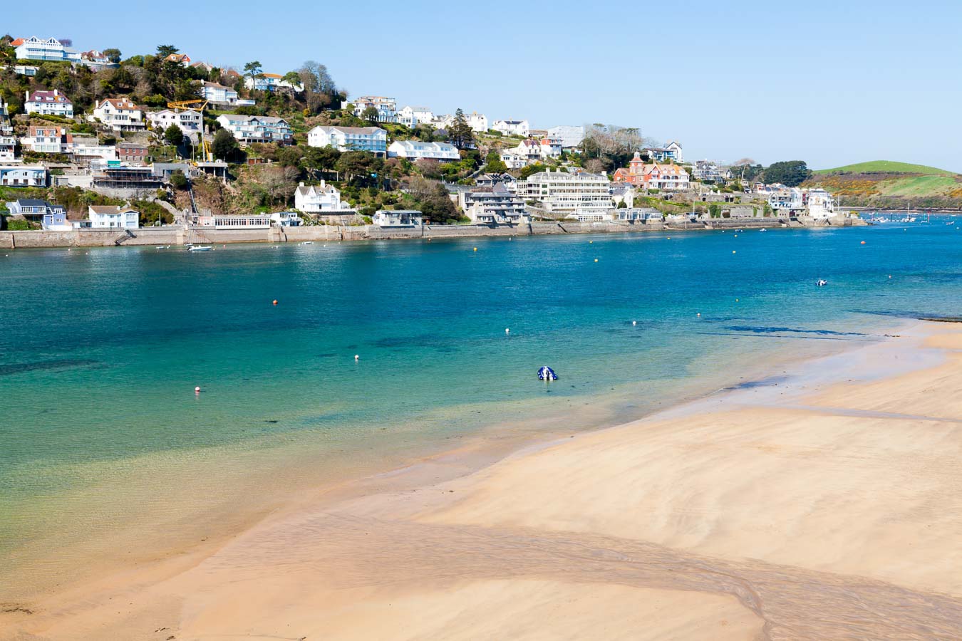 The shore line of Mill Bay looking towards Salcombe, South Devon. 