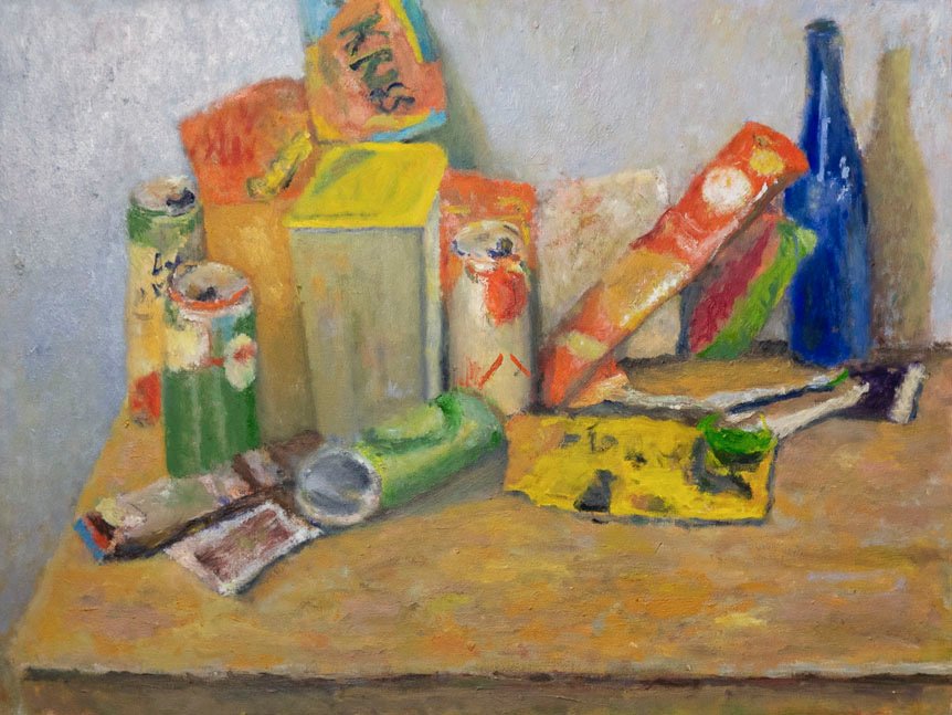 Items From The Bin With Blue Bottle and Candy Wrappers