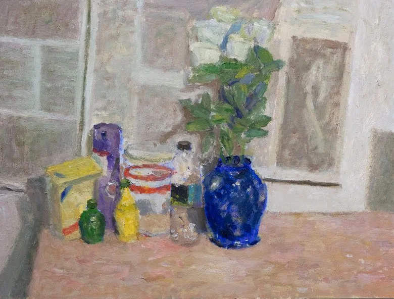 Items From Recycling With Vases and Flowers, In Front of Newspaper.