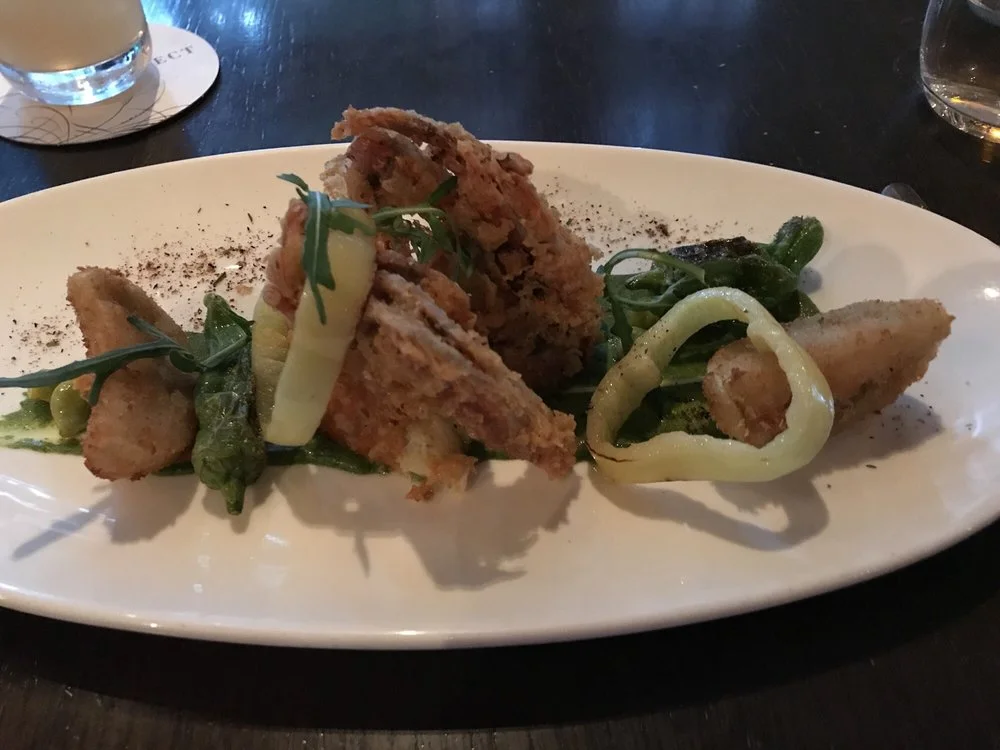 Smoked Eggplant, Slow Cooked Tomato & Ginger Cari, Fried Cauliflower, Cilantro. Photo via Yelp