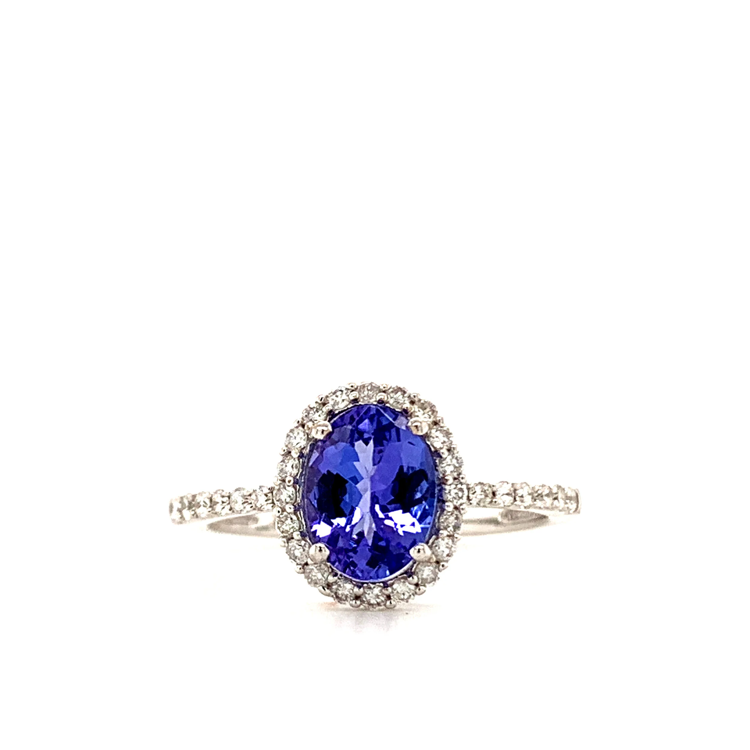 TANZANITE AND DIAMOND RING SET IN 14K WHITE GOLD