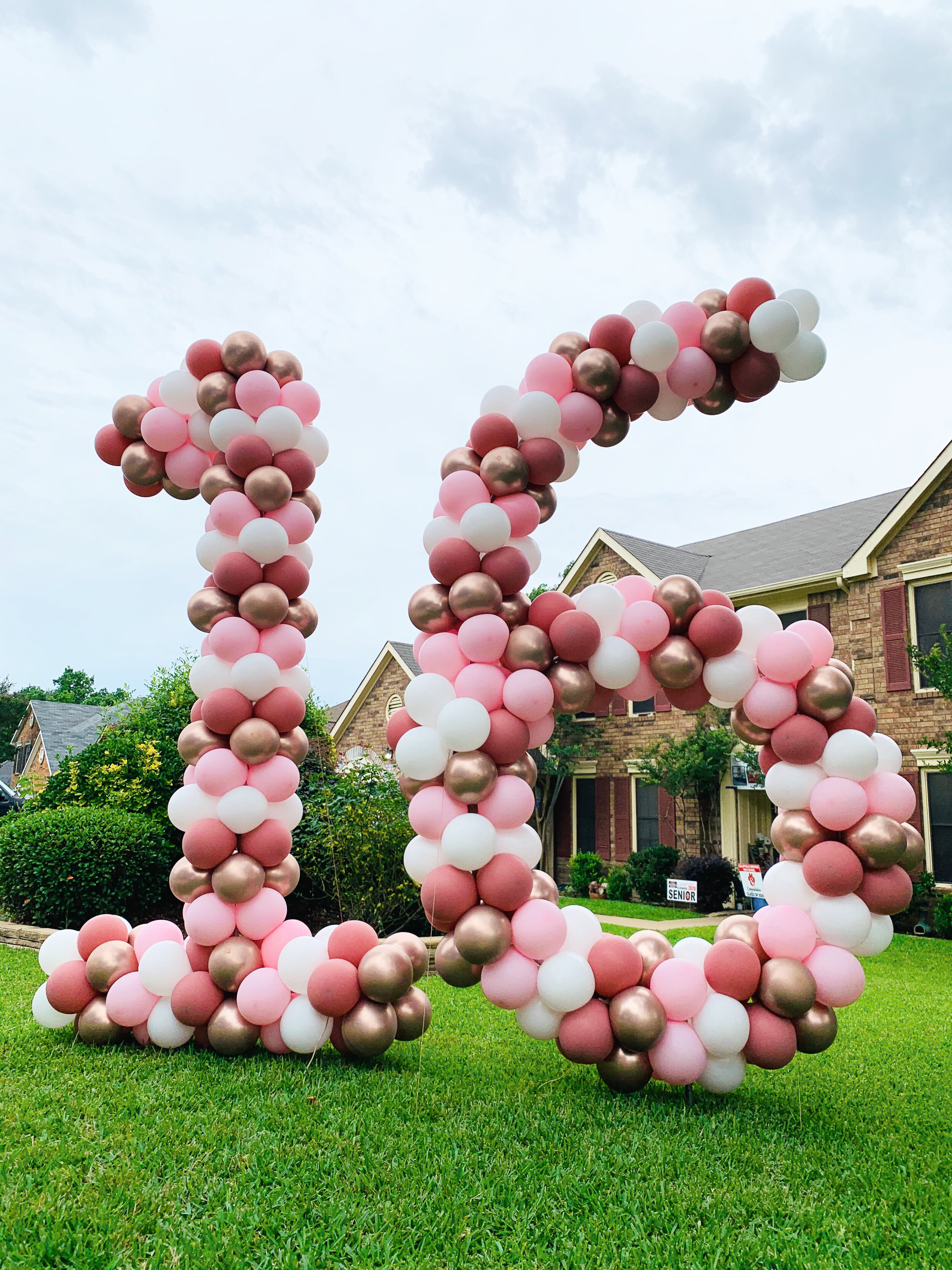  Yard balloon number 16 in rose gold and pink in Grapevine, Texas 