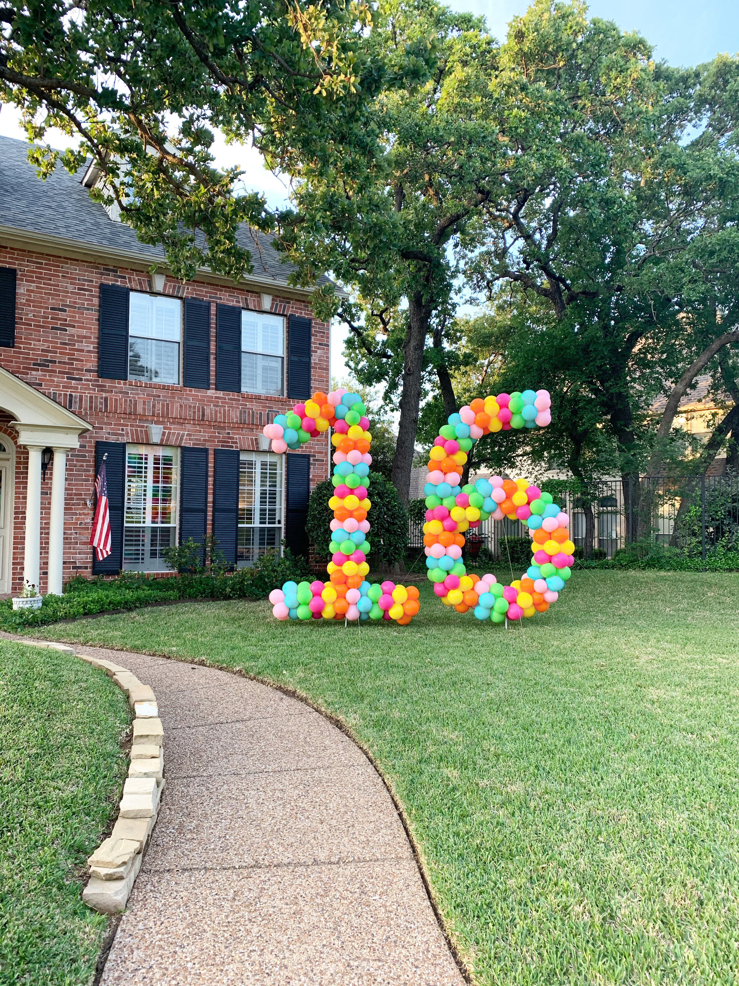  Balloon yard numbers in bright colors for Sweet 16 in Southlake, Texas 