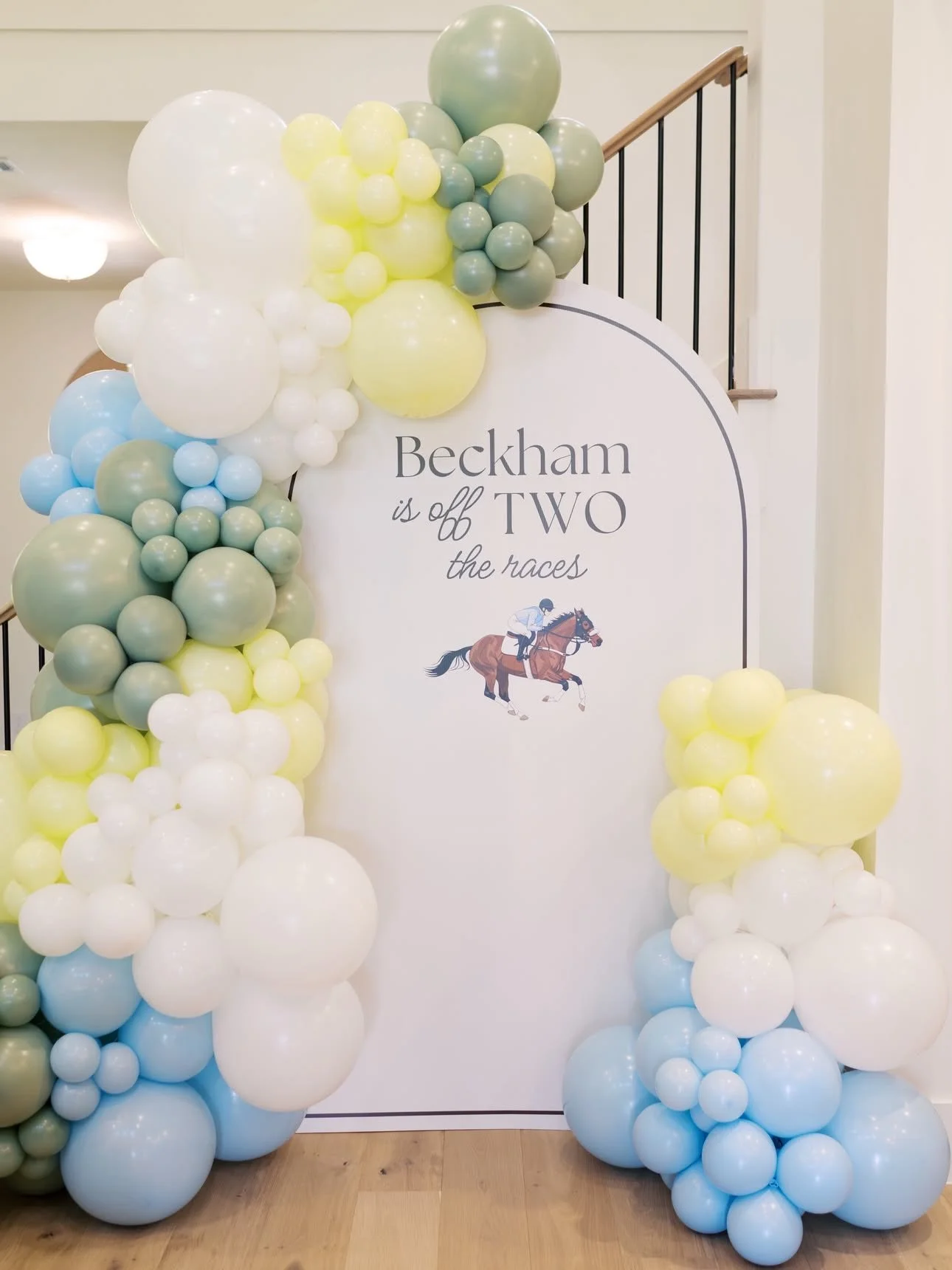 🏇✨ Beckham is officially off TWO the races! 🩵💛

We loved creating this custom horse racing birthday party balloon installation featuring soft blue, sage green, buttery yellow, and white organic balloons. From the personalized backdrop to the luxur