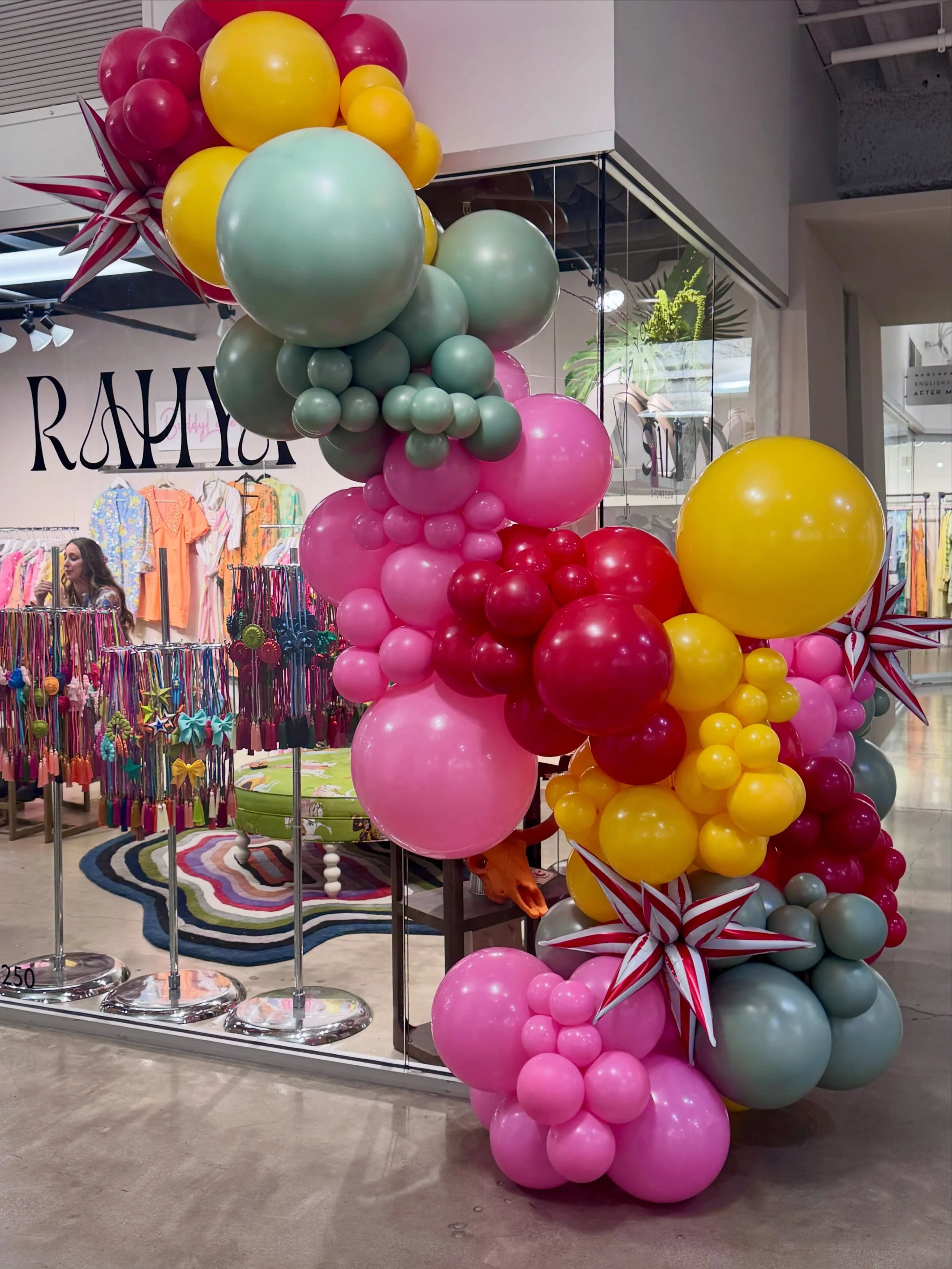 When your showroom needs to stand out, go BIG! 🎪✨

We brought a little circus magic to Dallas Market Center with a custom balloon installation for @thesaltshowroom, featuring jewelry designer @rahyajewelrydesign.

Bold colors, oversized balloons, an
