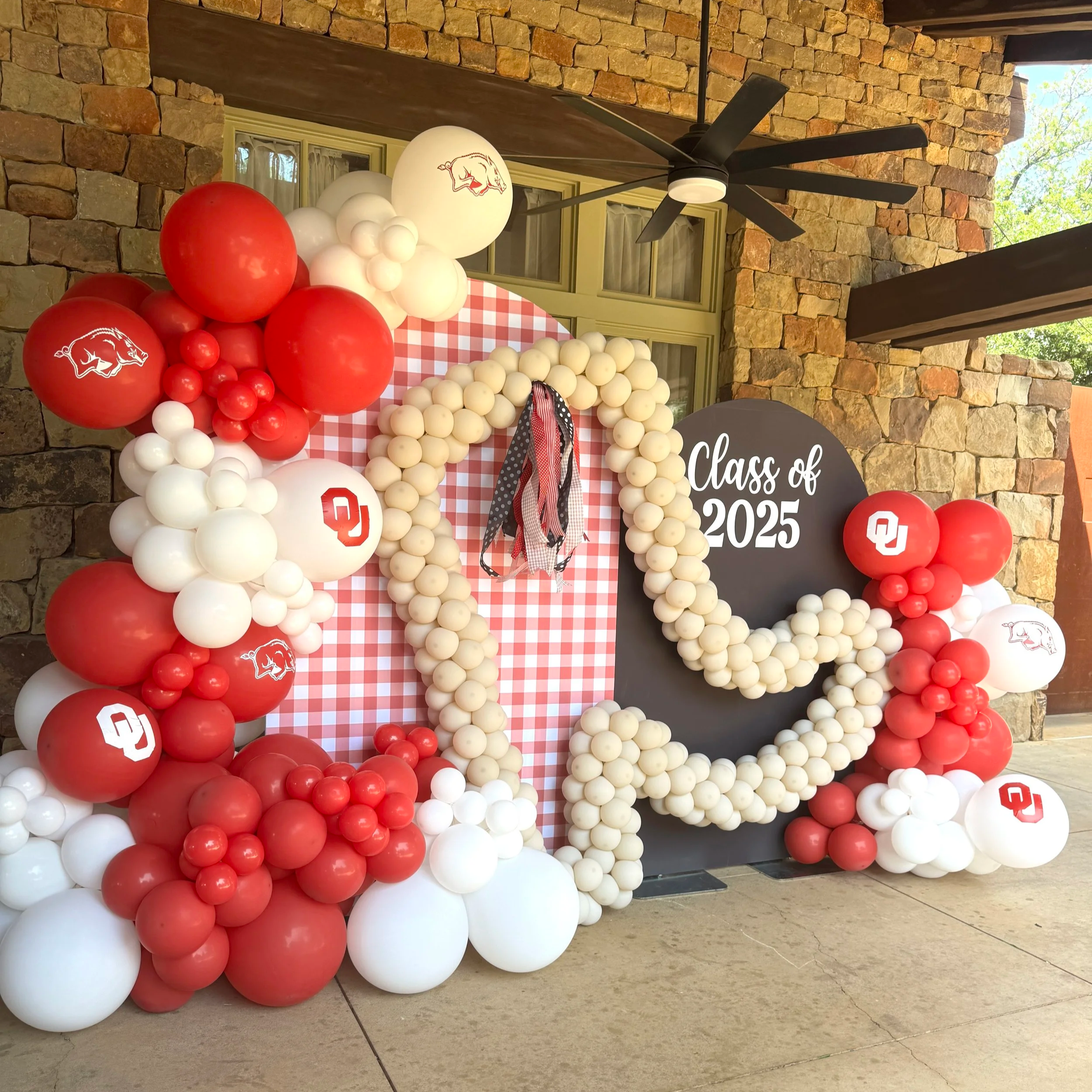 Branded balloon decor for graduation event in DFW