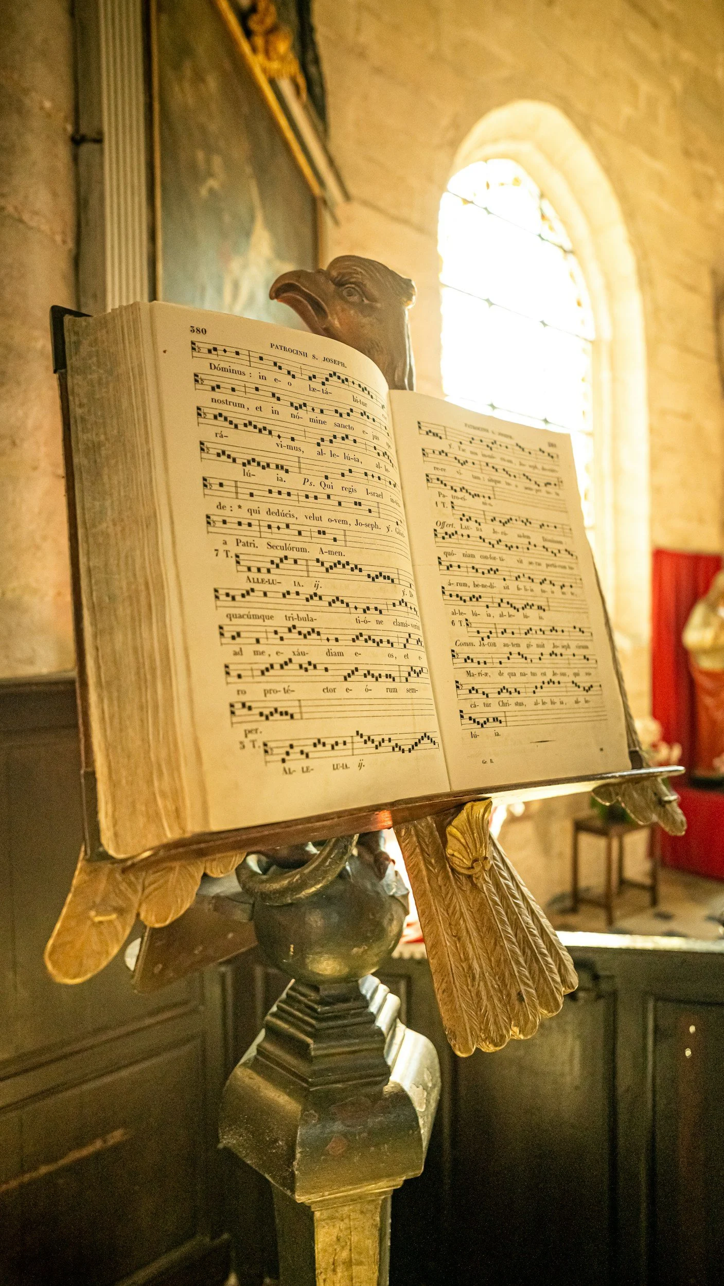 Medieval music notation on a large stand